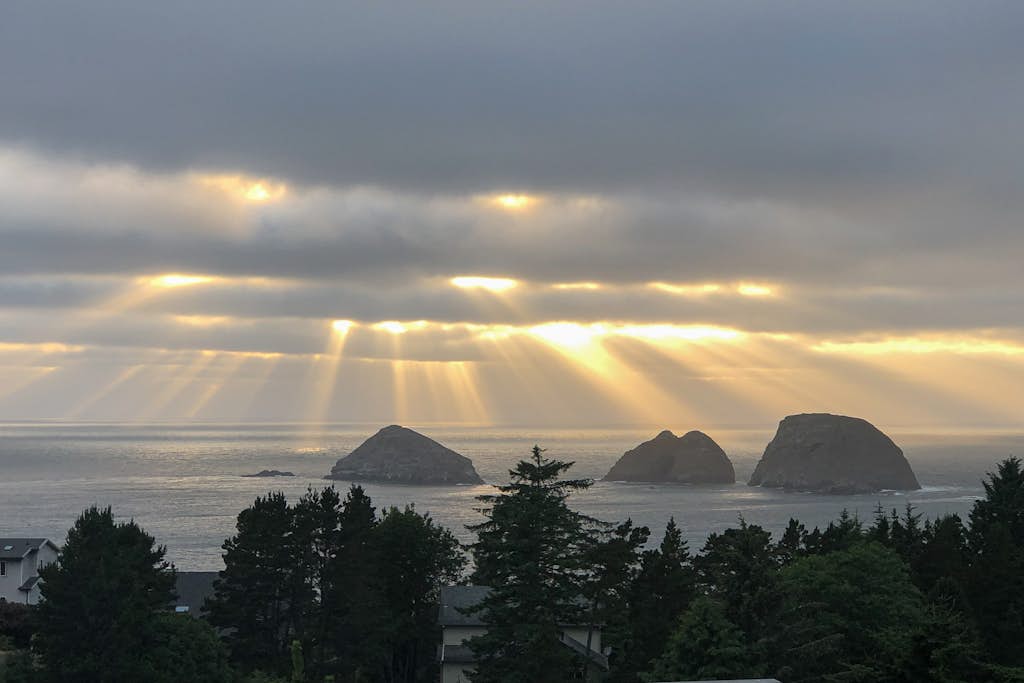 Sweeping ocean view home with fireplace grill and foosball table dog friendly