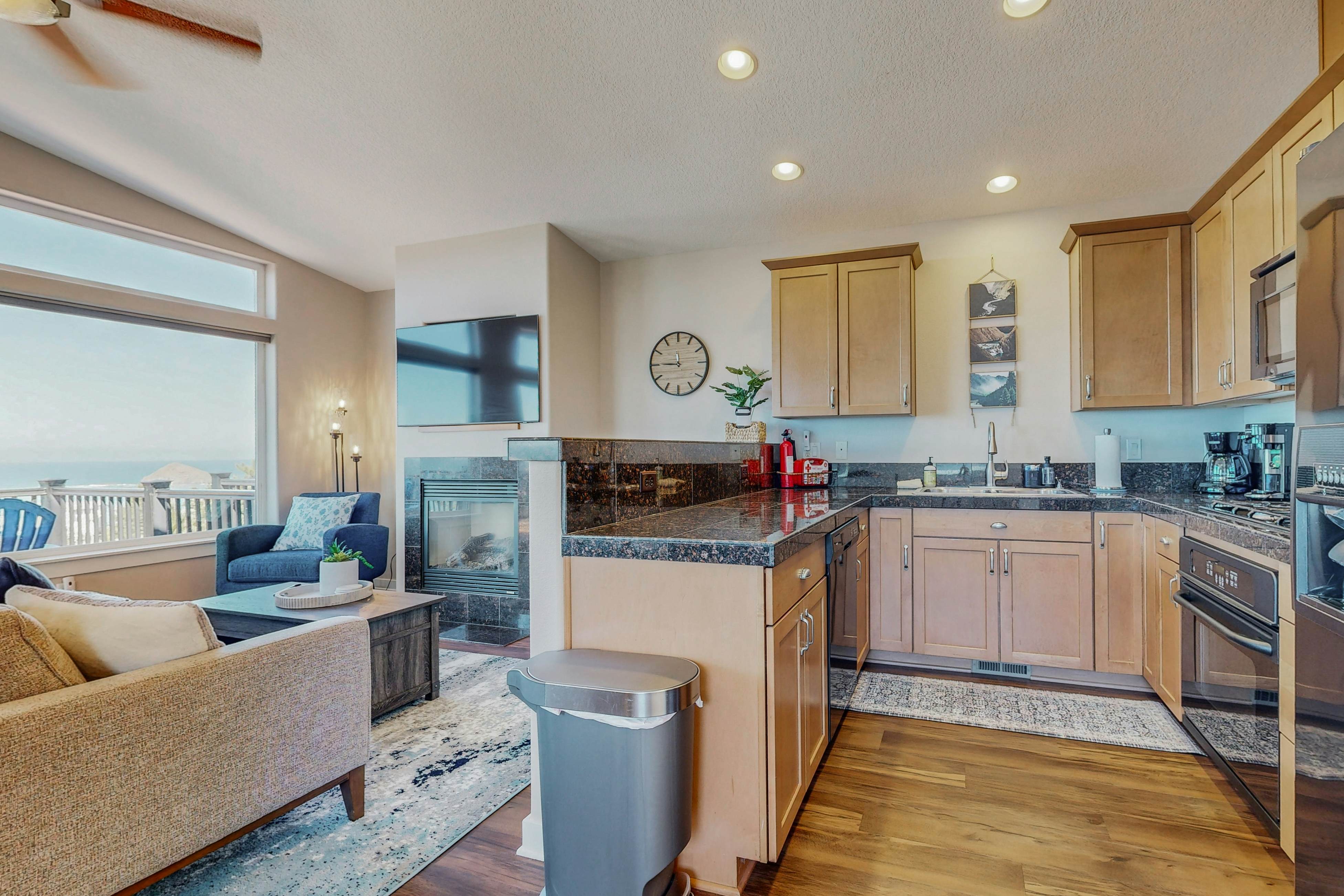 Sweeping ocean-view home with fireplace, grill, & foosball table - dog-friendly