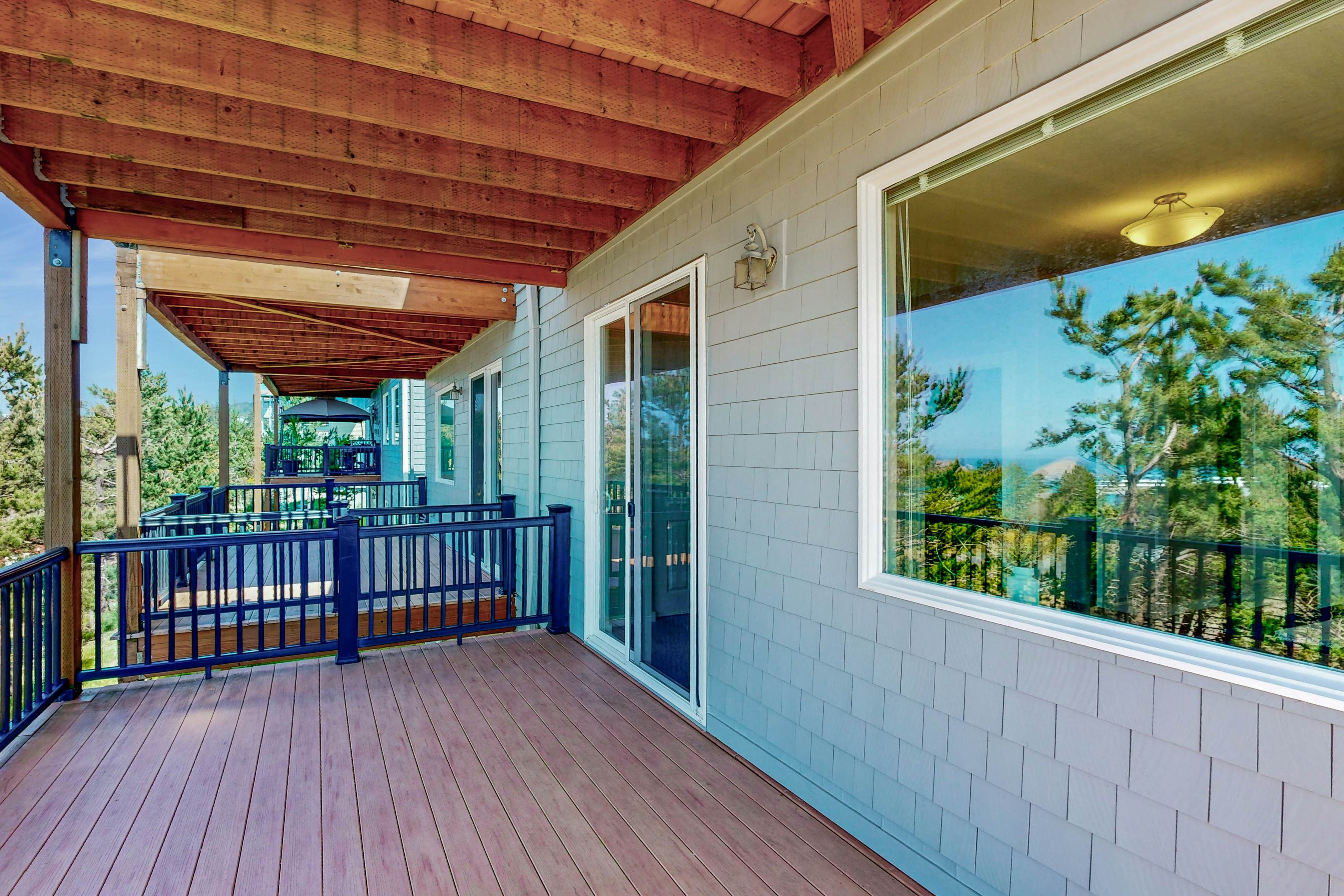Sweeping ocean-view home with fireplace, grill, & foosball table - dog-friendly