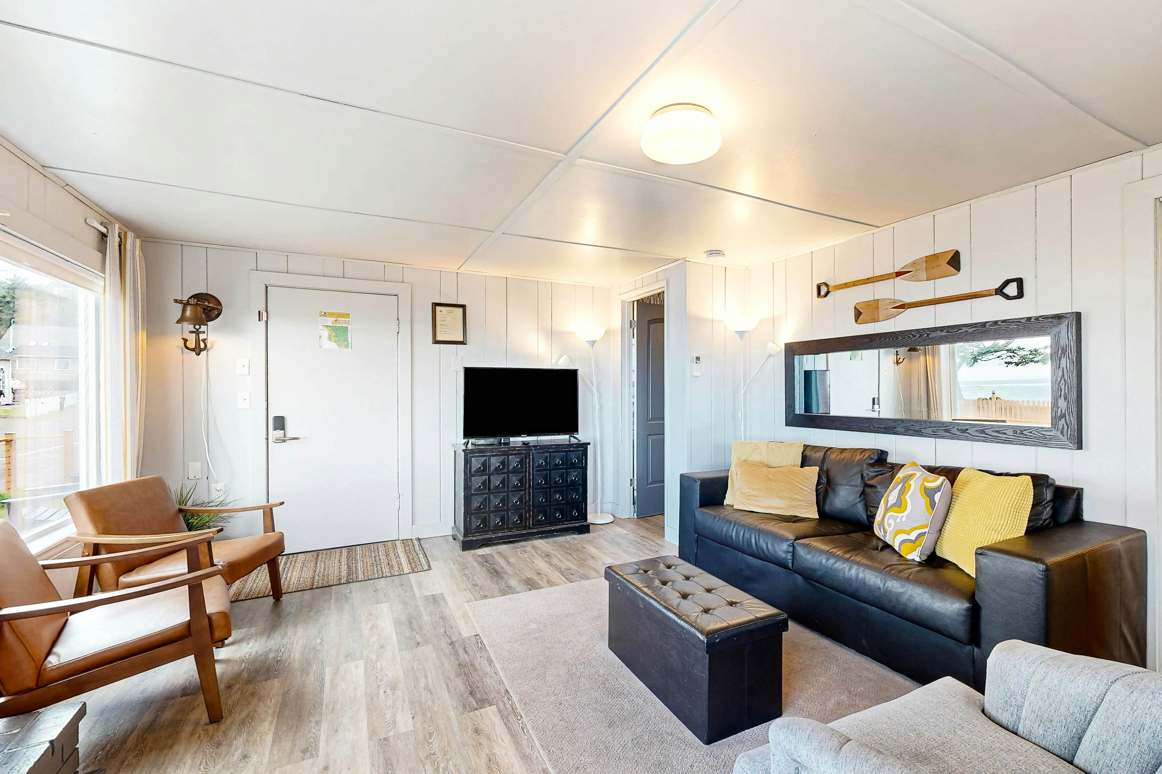 Quaint oceanfront hideaway with open layout fireplace central AC and gas grill