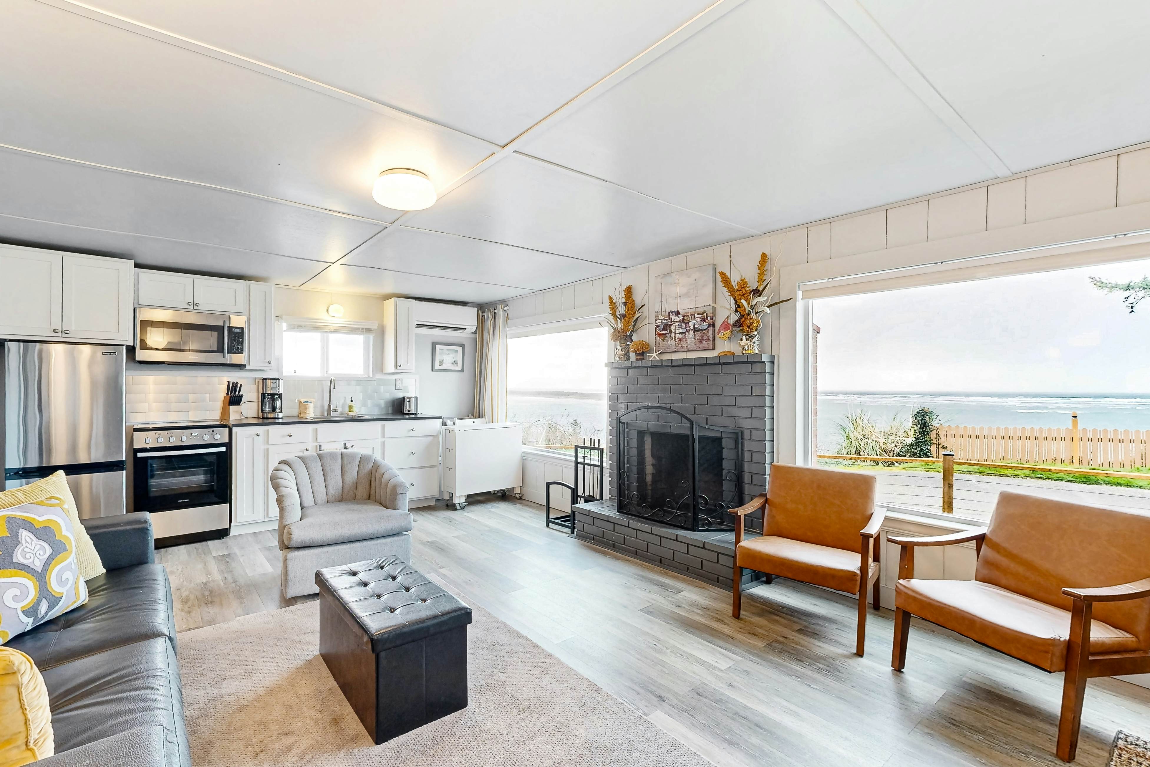 Quaint oceanfront hideaway with open layout fireplace central AC and gas grill