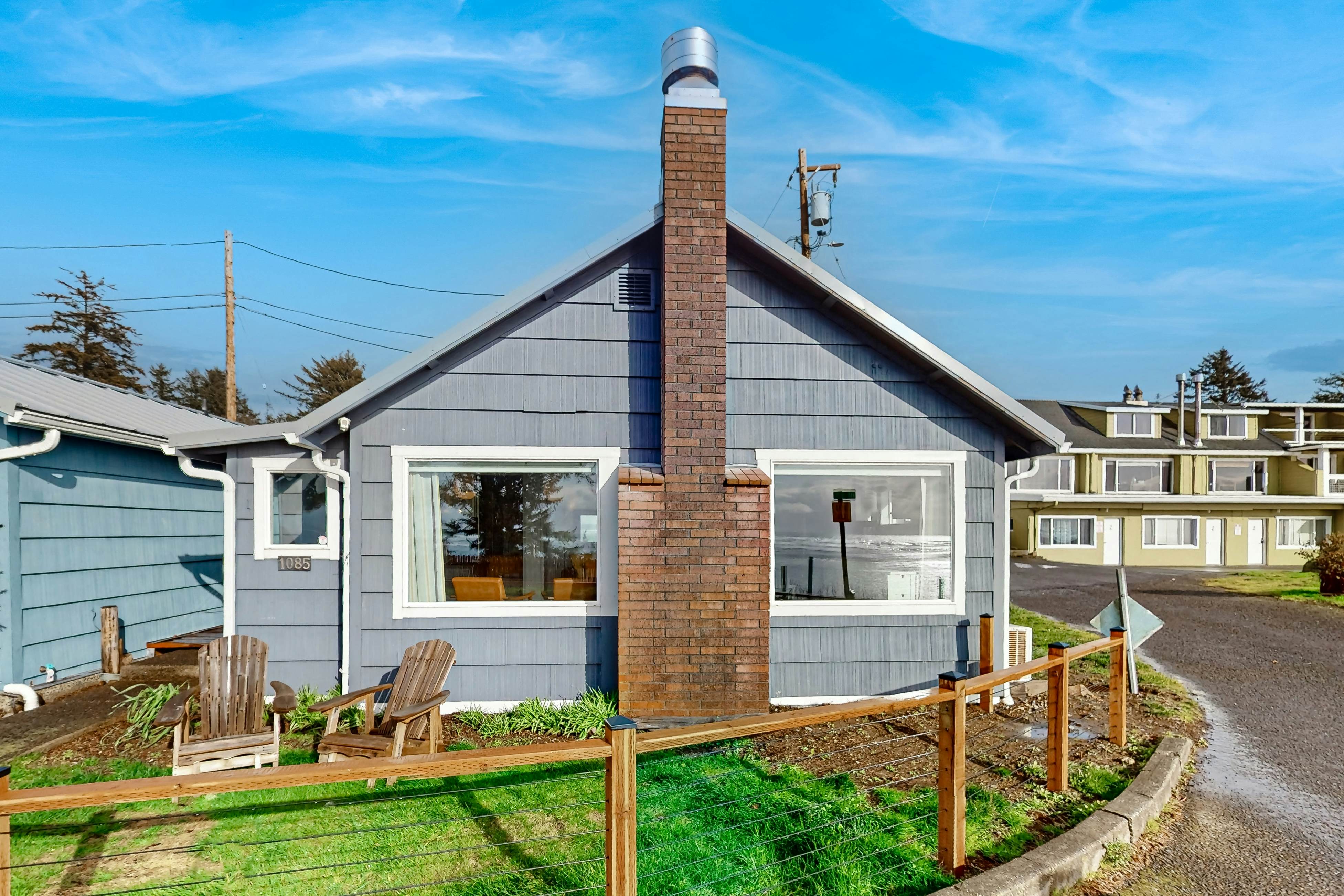 Quaint oceanfront hideaway with open layout fireplace central AC and gas grill