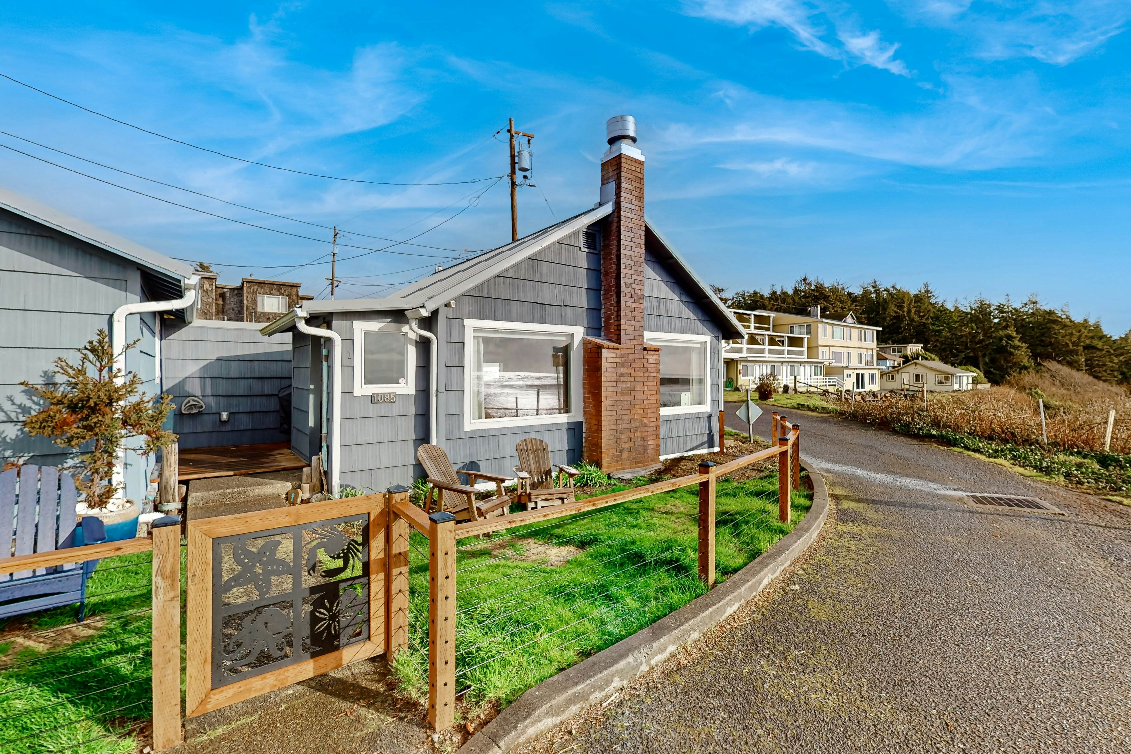 Quaint oceanfront hideaway with open layout fireplace central AC and gas grill