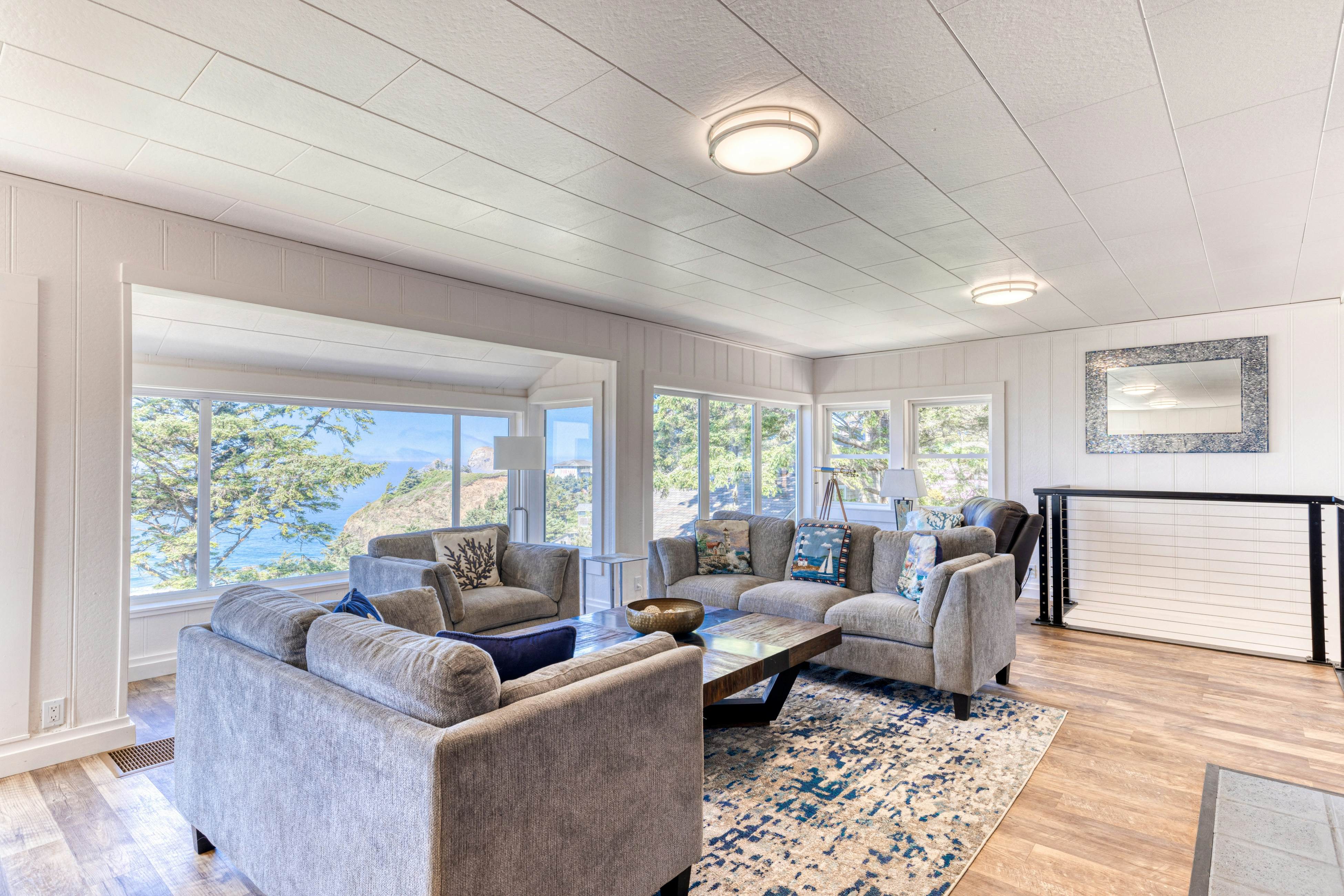 Amazing ocean-view escape with seven bedrooms, scenic patios, & modern interior