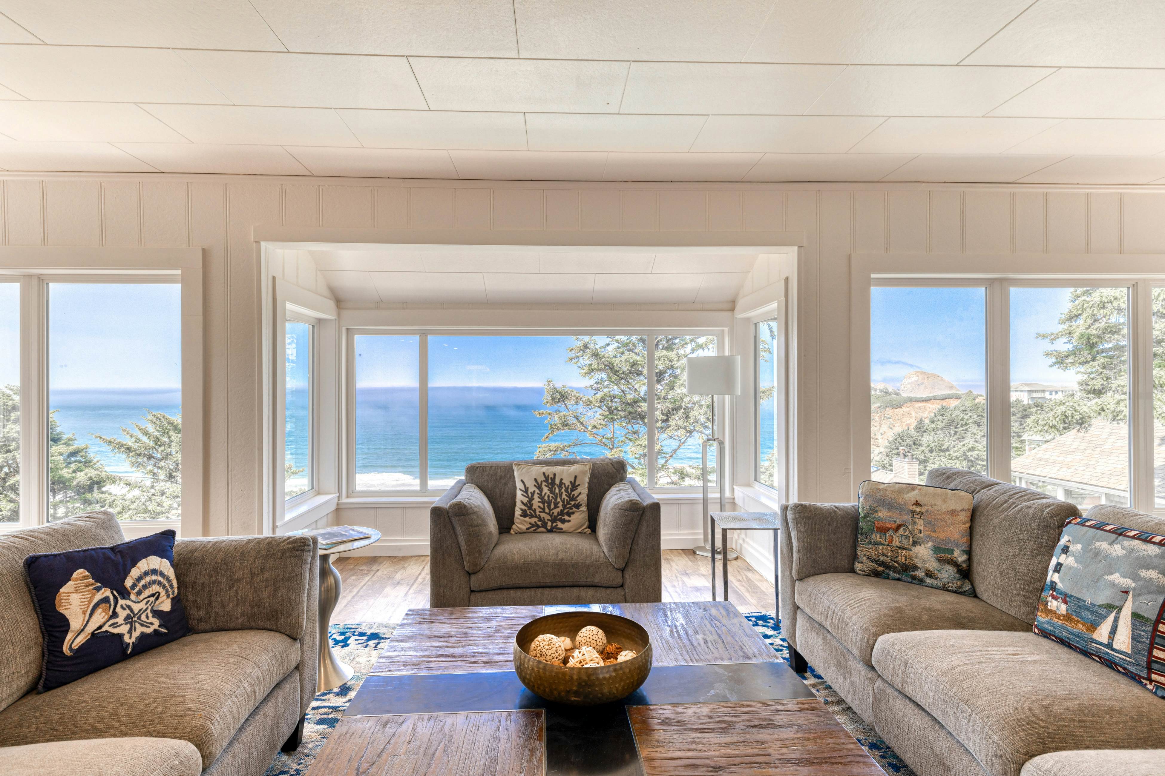 Amazing ocean-view escape with seven bedrooms, scenic patios, & modern interior