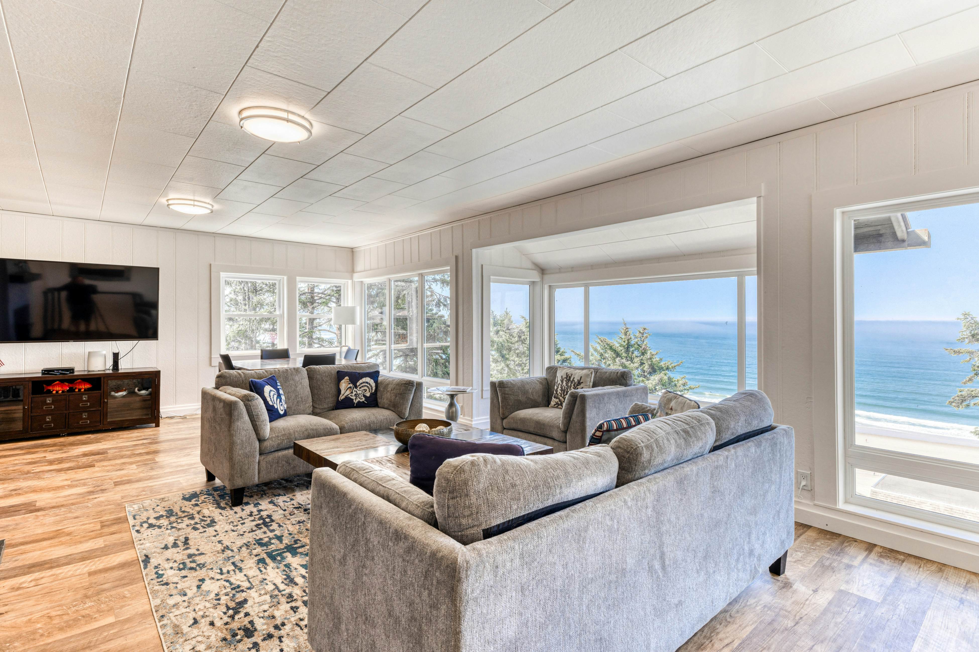 Amazing ocean-view escape with seven bedrooms, scenic patios, & modern interior