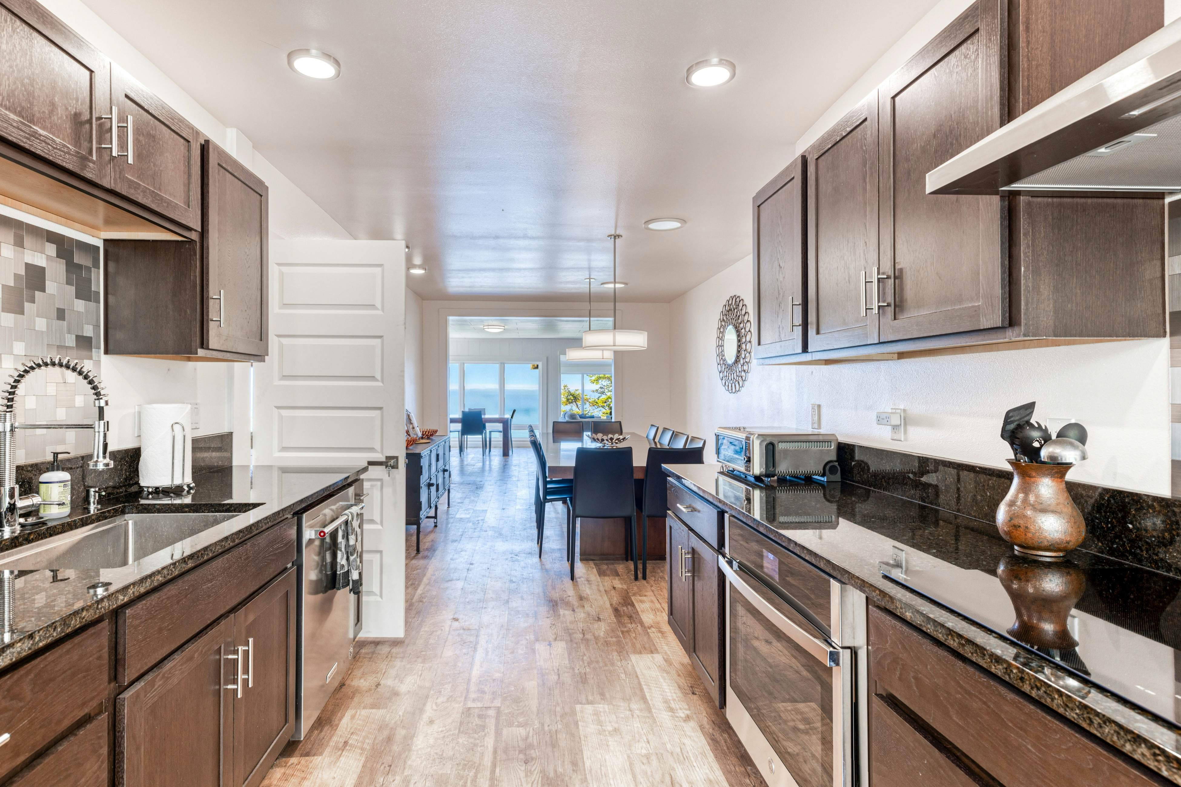 Amazing ocean-view escape with seven bedrooms, scenic patios, & modern interior