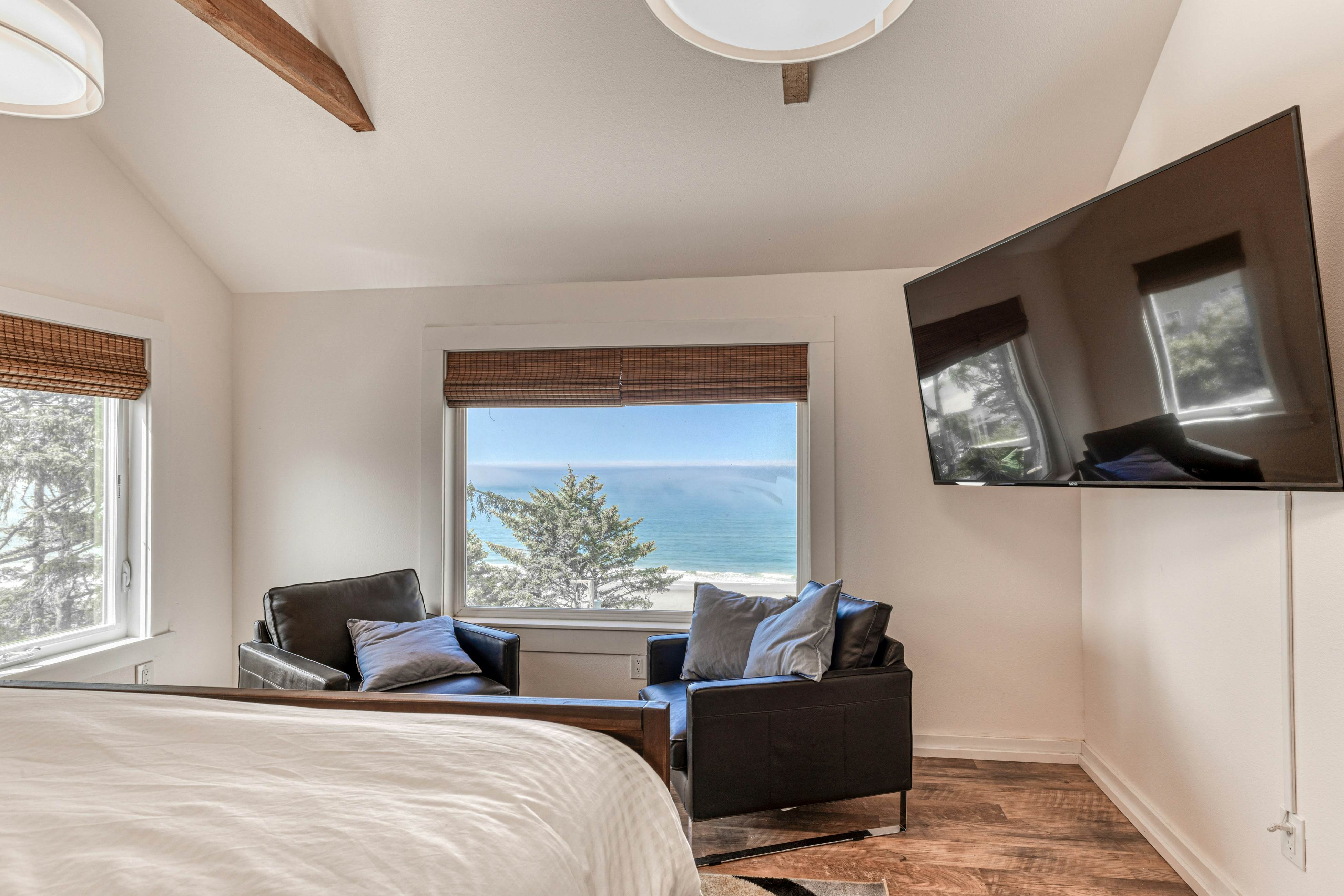 Amazing ocean-view escape with seven bedrooms, scenic patios, & modern interior