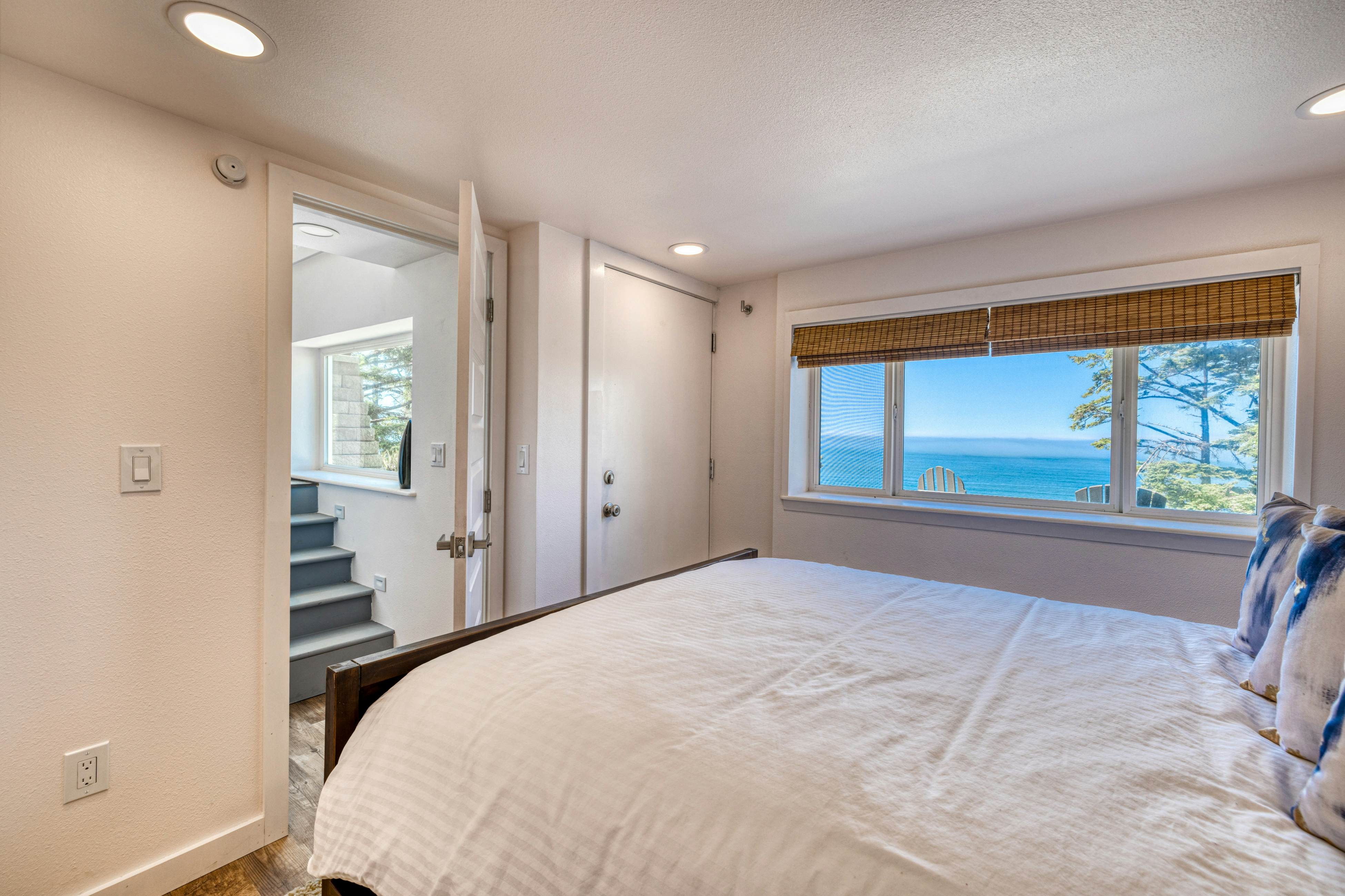 Amazing ocean-view escape with seven bedrooms, scenic patios, & modern interior