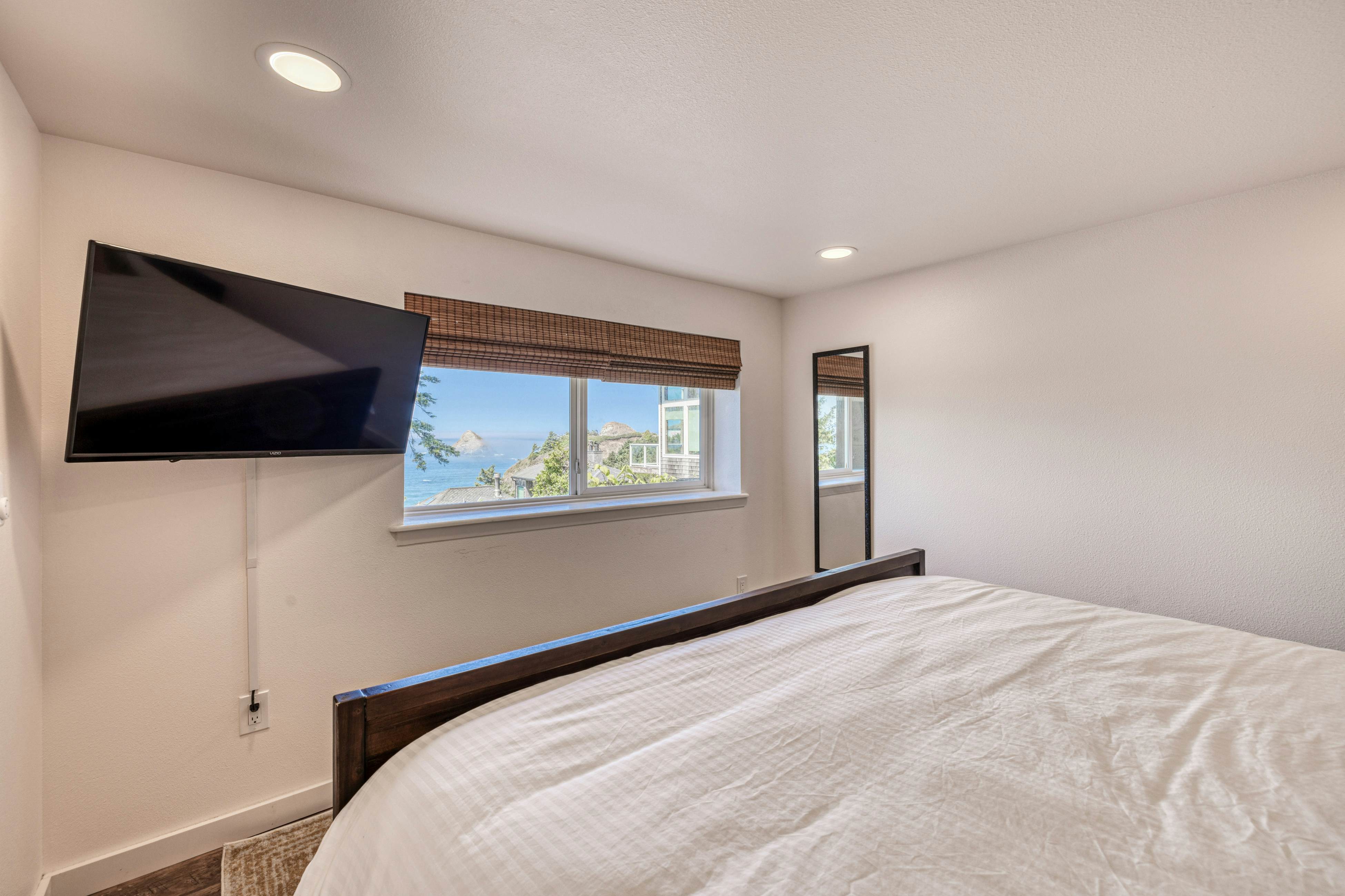 Amazing ocean-view escape with seven bedrooms, scenic patios, & modern interior