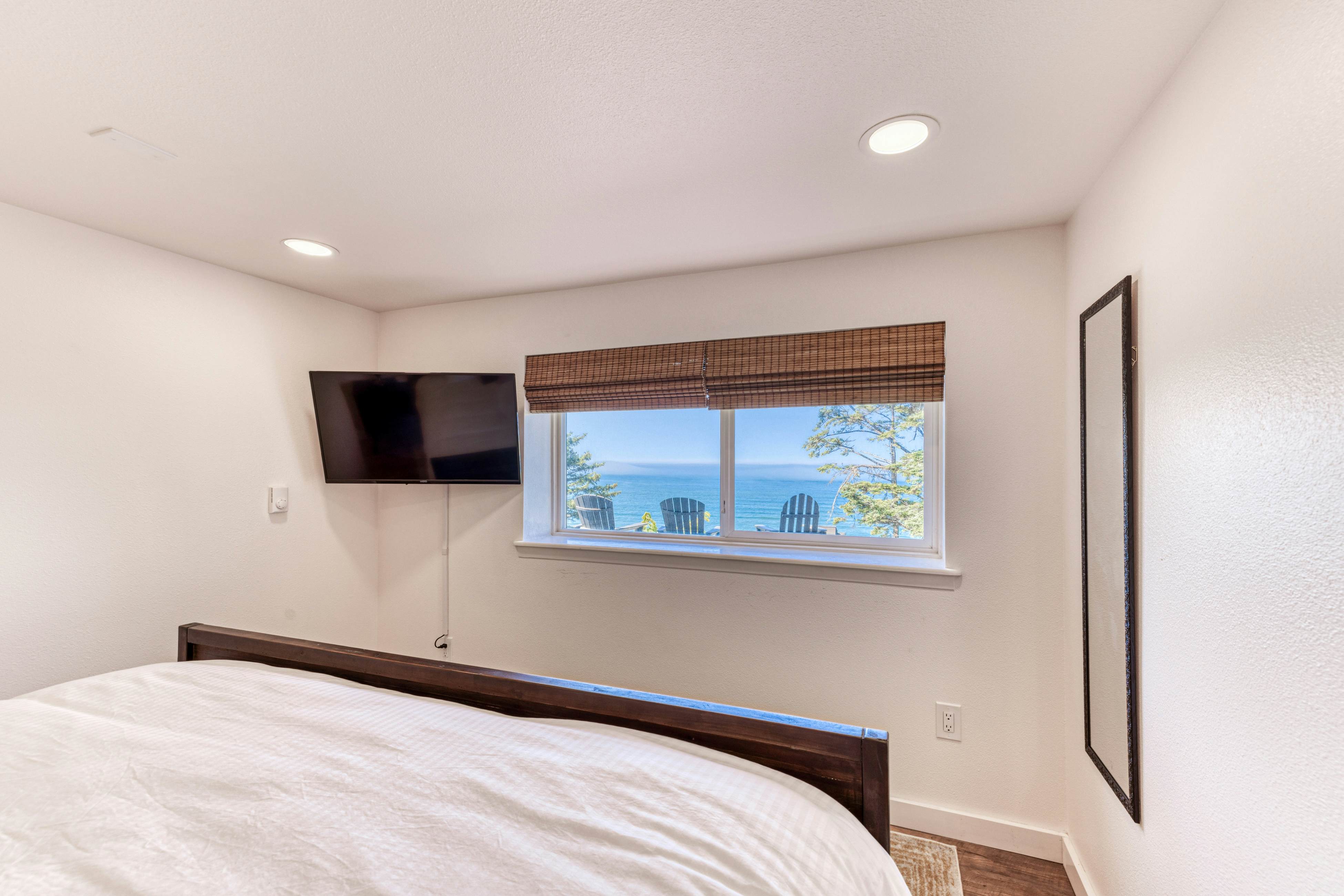 Amazing ocean-view escape with seven bedrooms, scenic patios, & modern interior