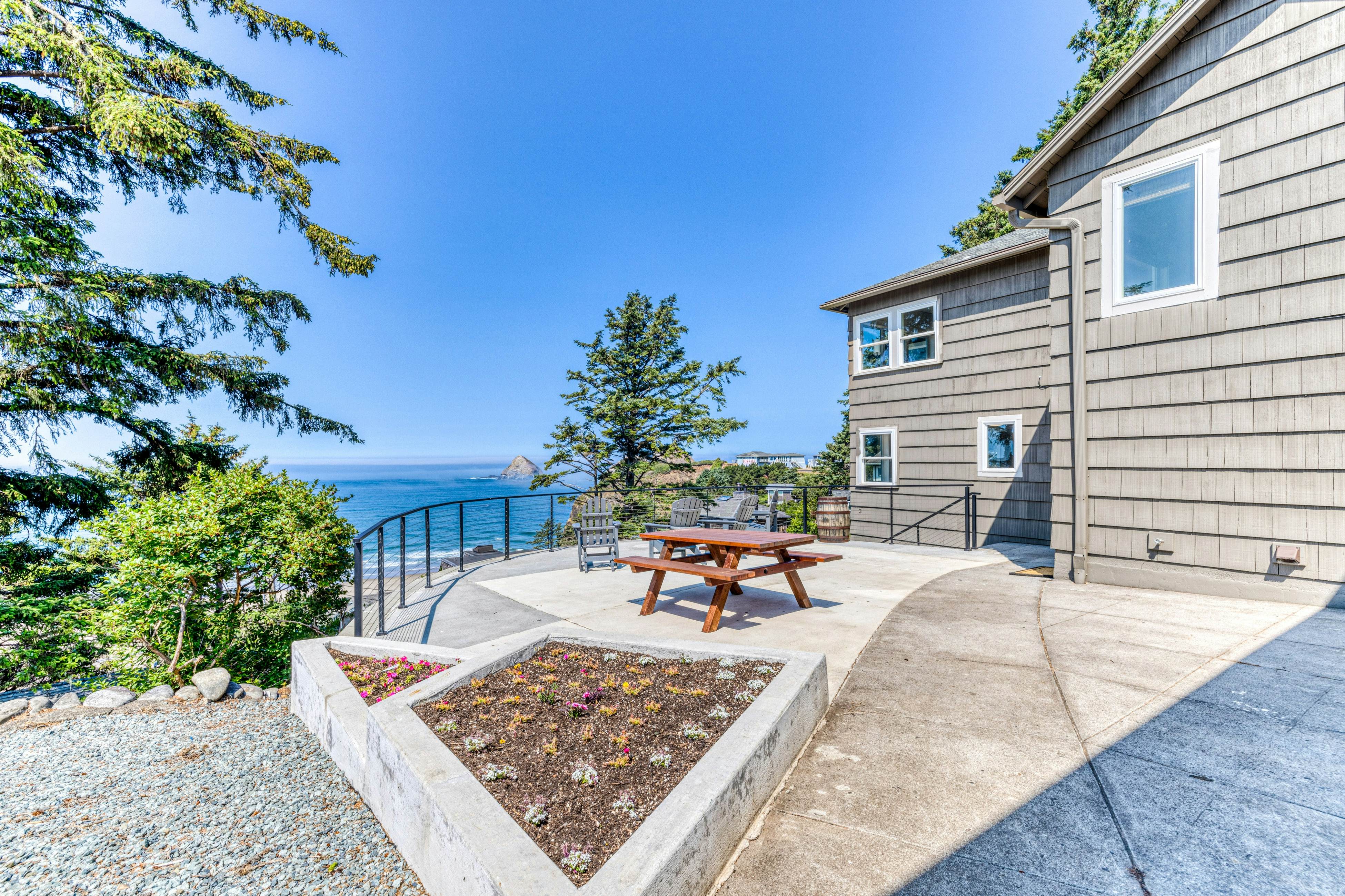 Amazing ocean-view escape with seven bedrooms, scenic patios, & modern interior