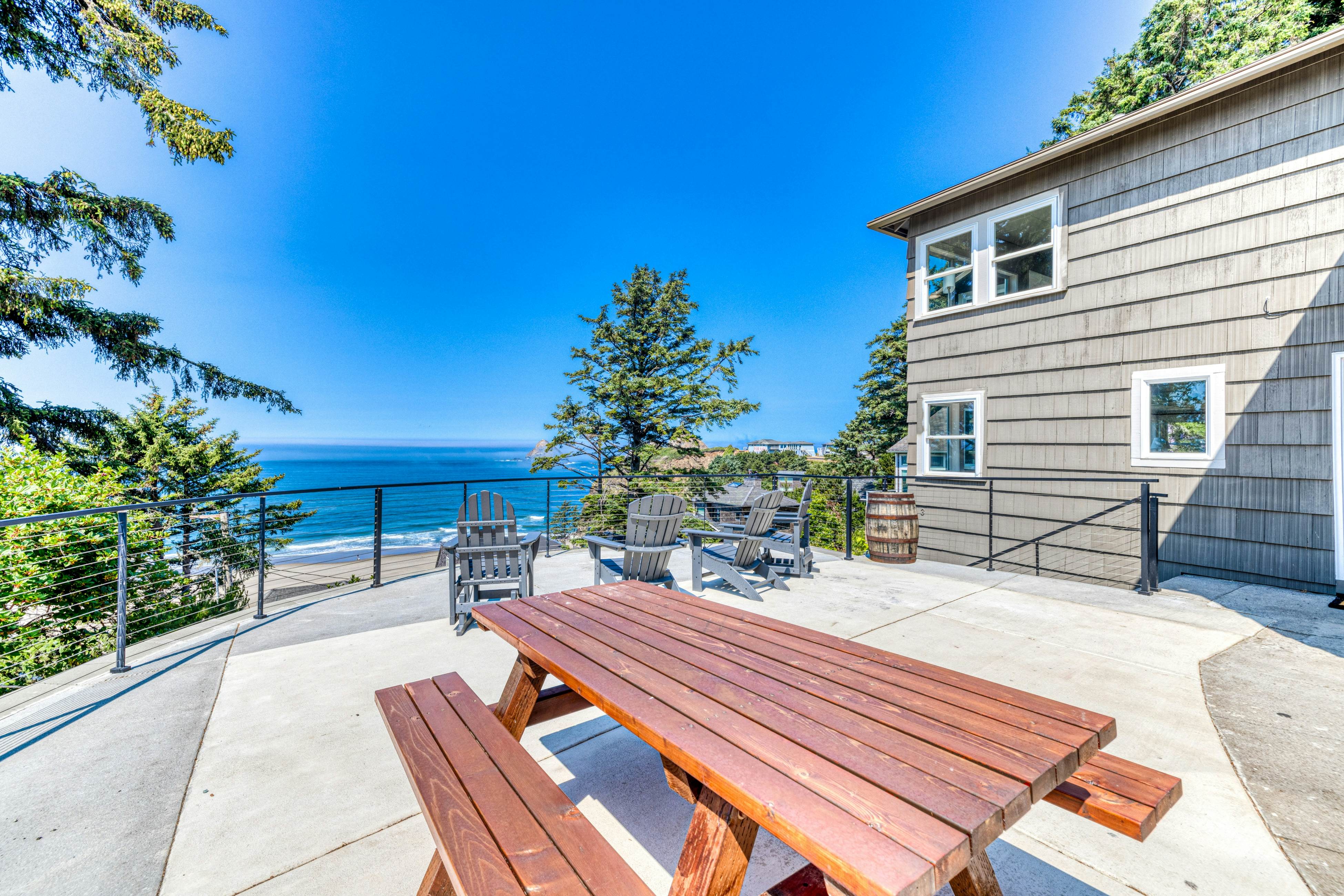 Amazing ocean-view escape with seven bedrooms, scenic patios, & modern interior