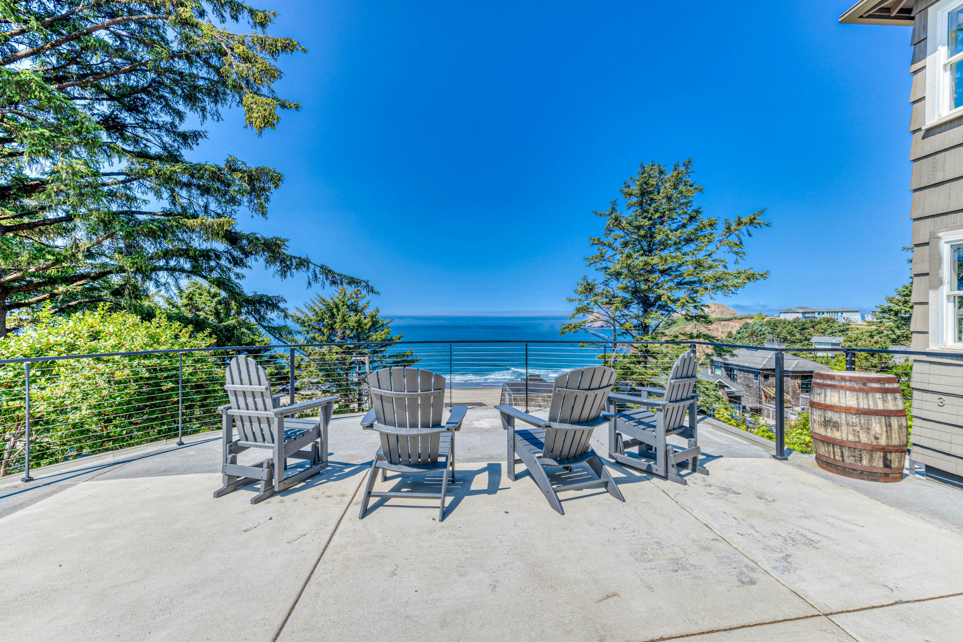 Amazing ocean-view escape with seven bedrooms, scenic patios, & modern interior