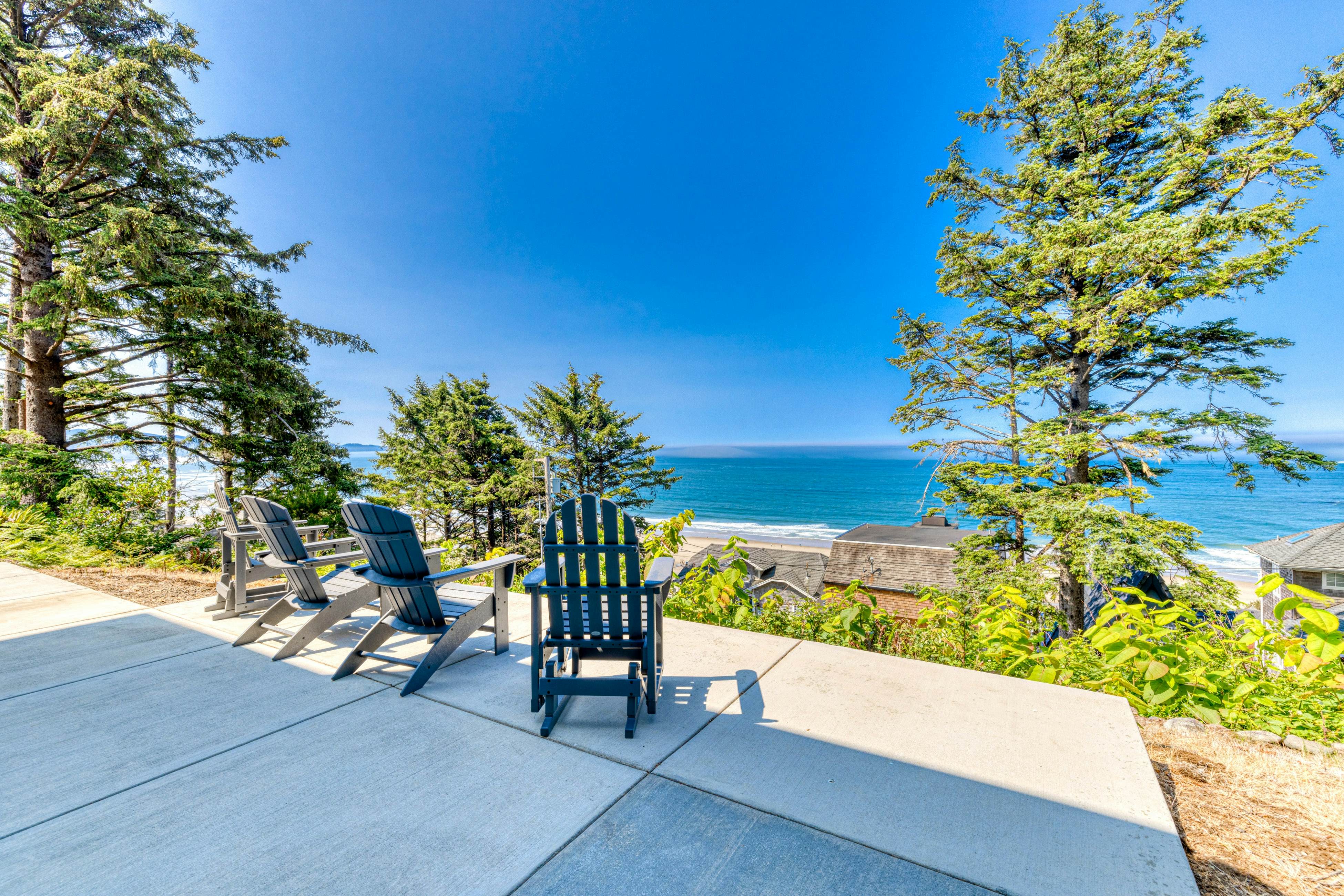 Amazing ocean-view escape with seven bedrooms, scenic patios, & modern interior
