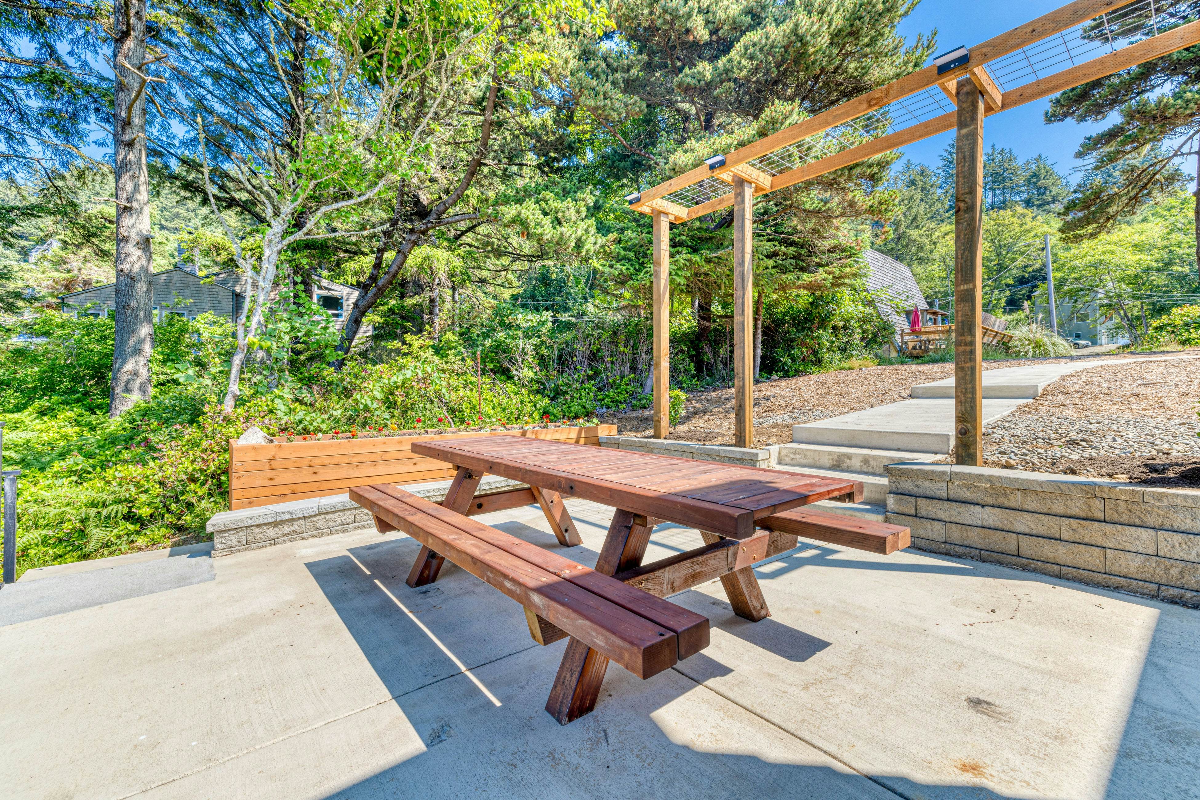 Amazing ocean-view escape with seven bedrooms, scenic patios, & modern interior