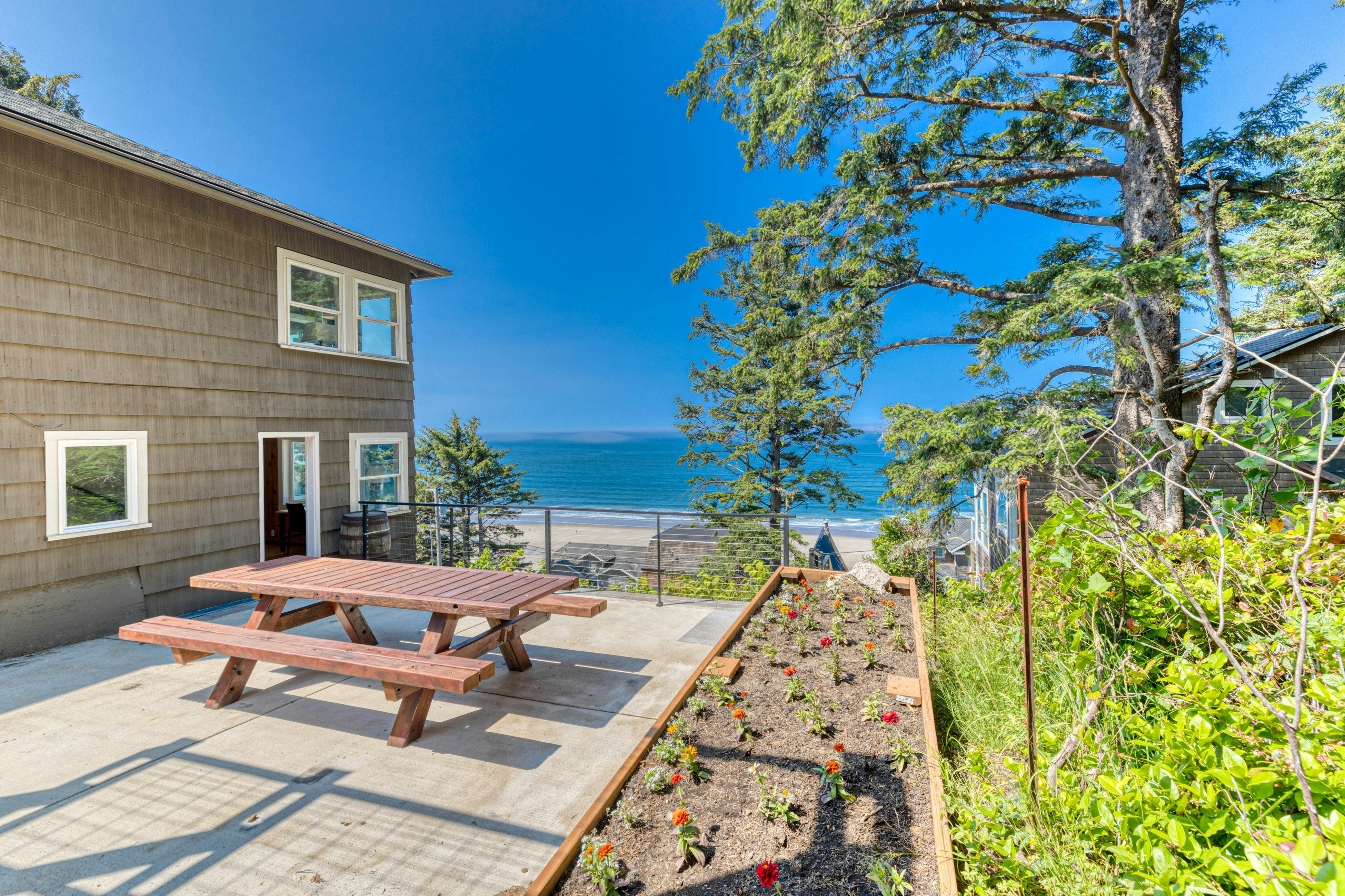 Amazing ocean-view escape with seven bedrooms, scenic patios, & modern interior