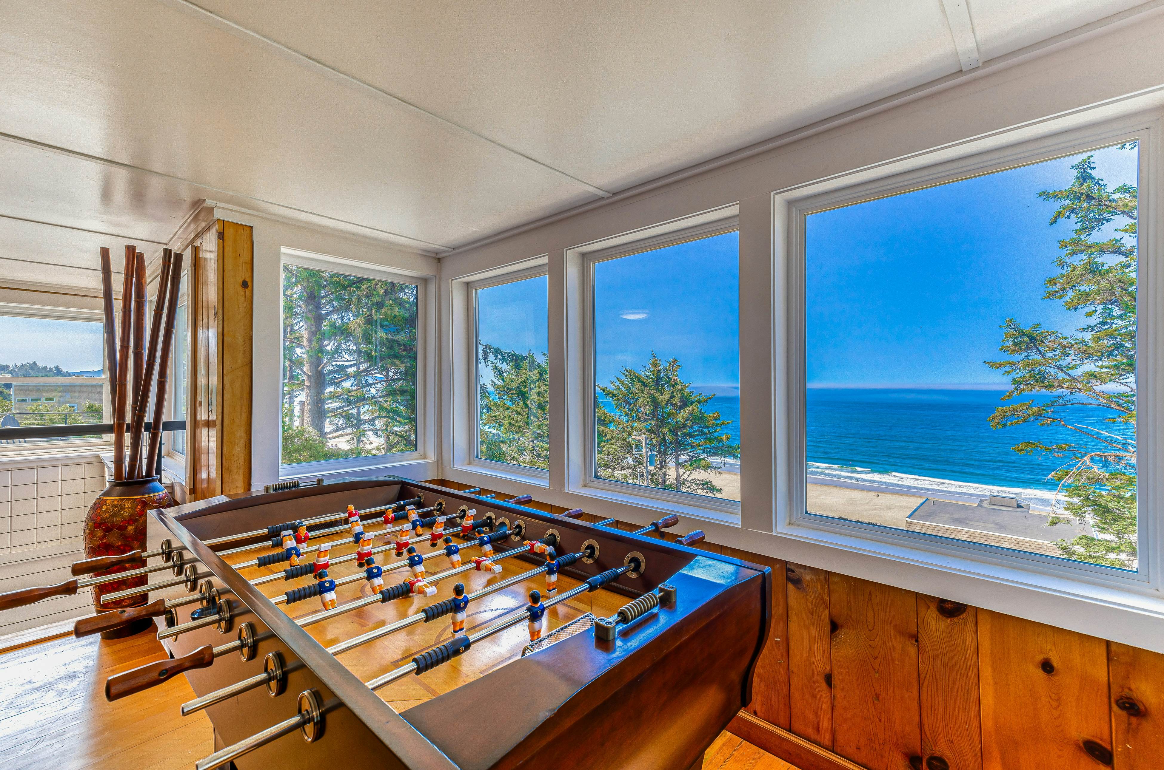 Spacious ocean view home with wood fireplace, grill, & deck - dog-friendly