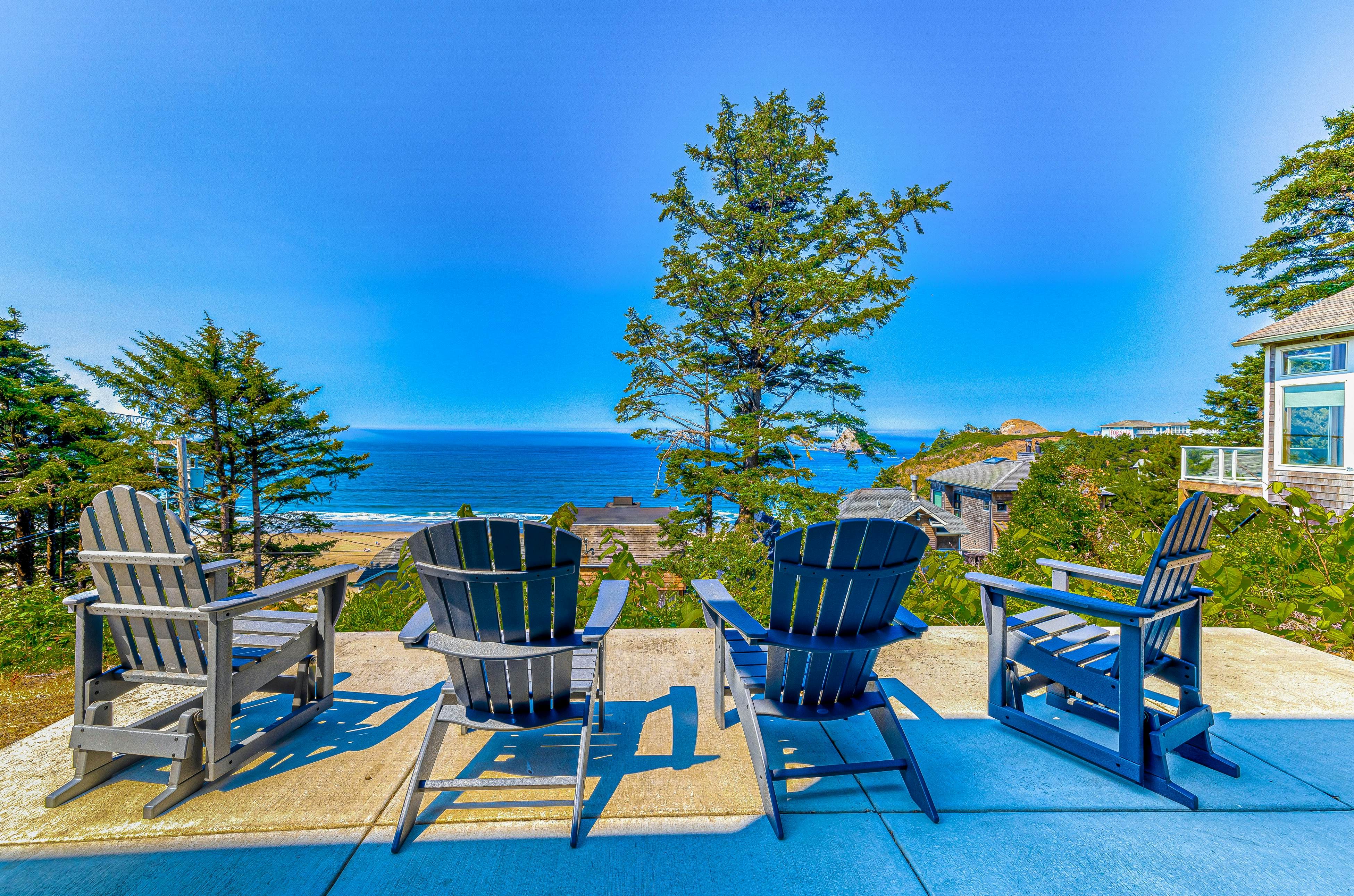 Spacious ocean view home with wood fireplace, grill, & deck - dog-friendly