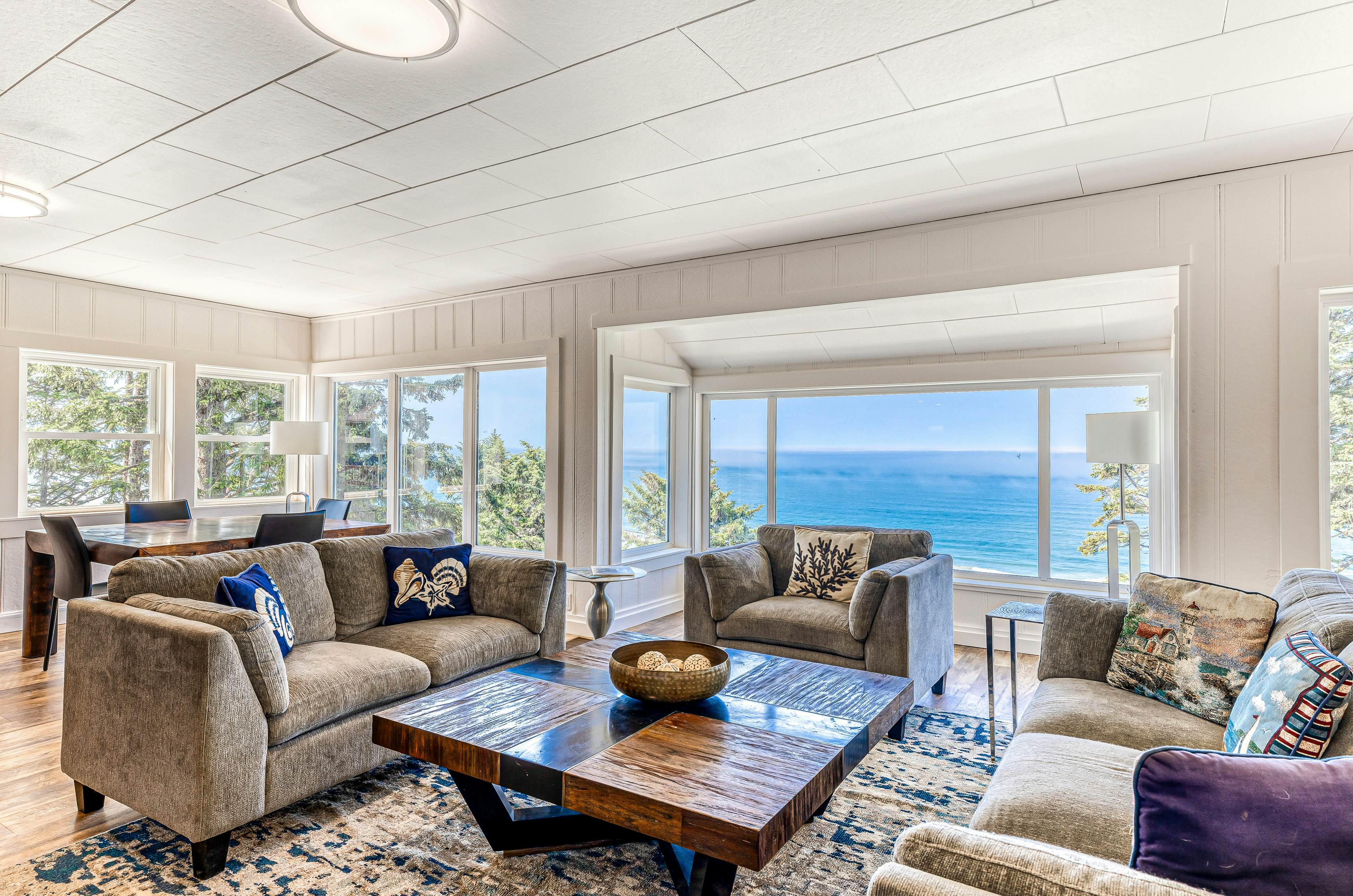 Spacious ocean view home with wood fireplace, grill, & deck - dog-friendly
