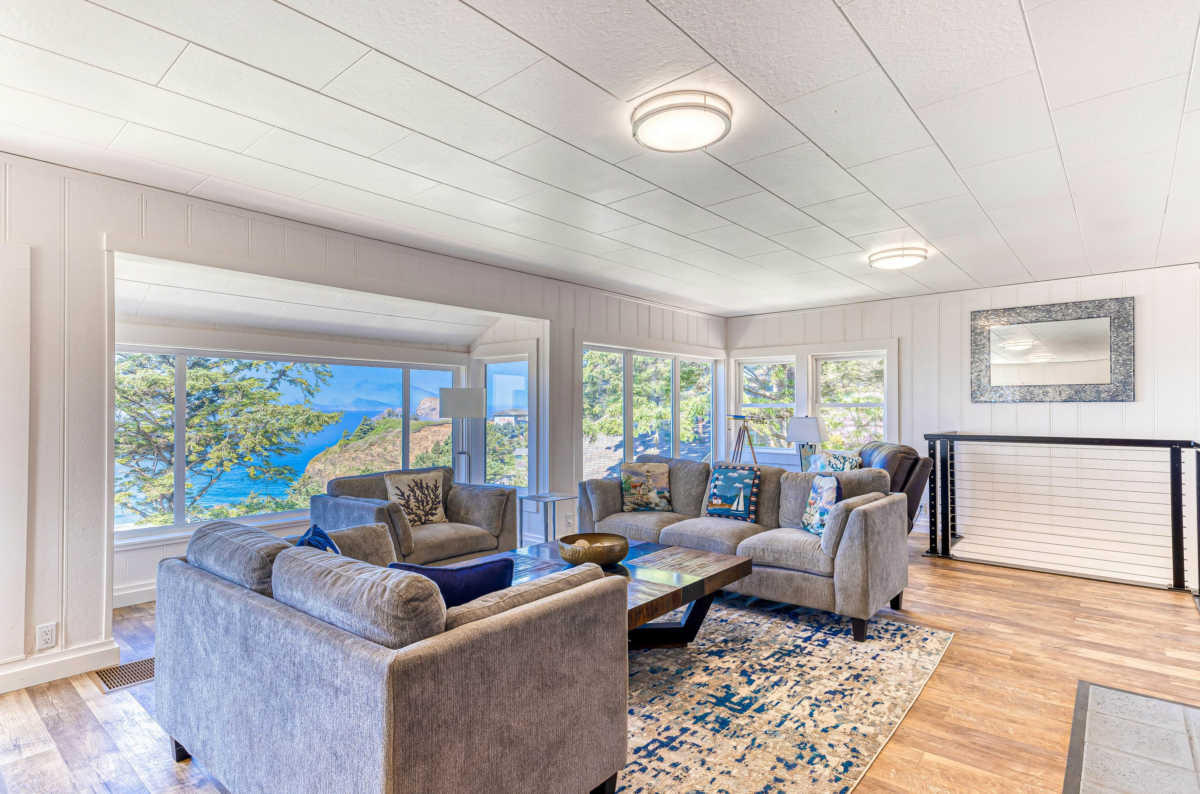 Spacious ocean view home with wood fireplace, grill, & deck - dog-friendly