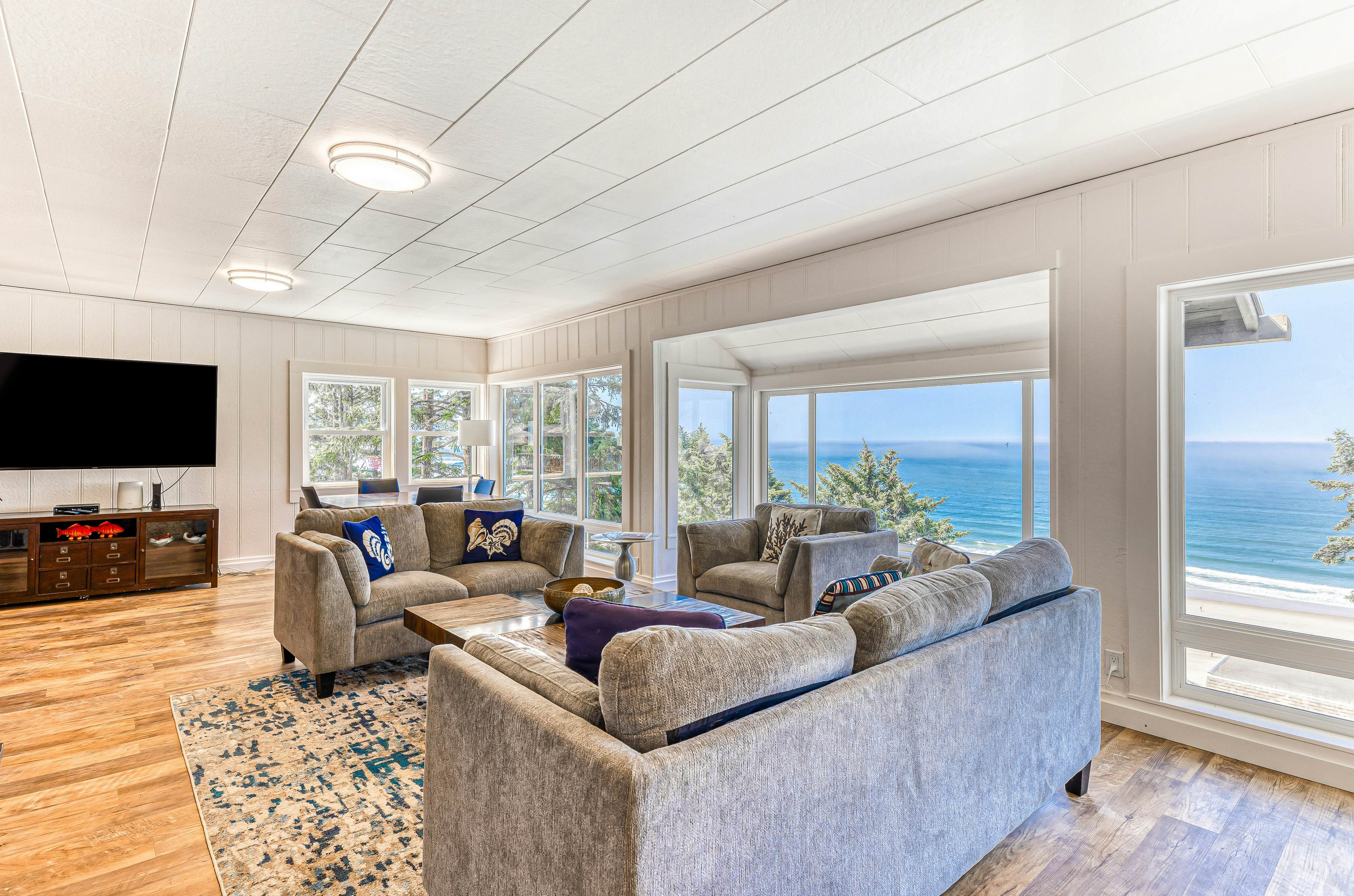 Spacious ocean view home with wood fireplace, grill, & deck - dog-friendly