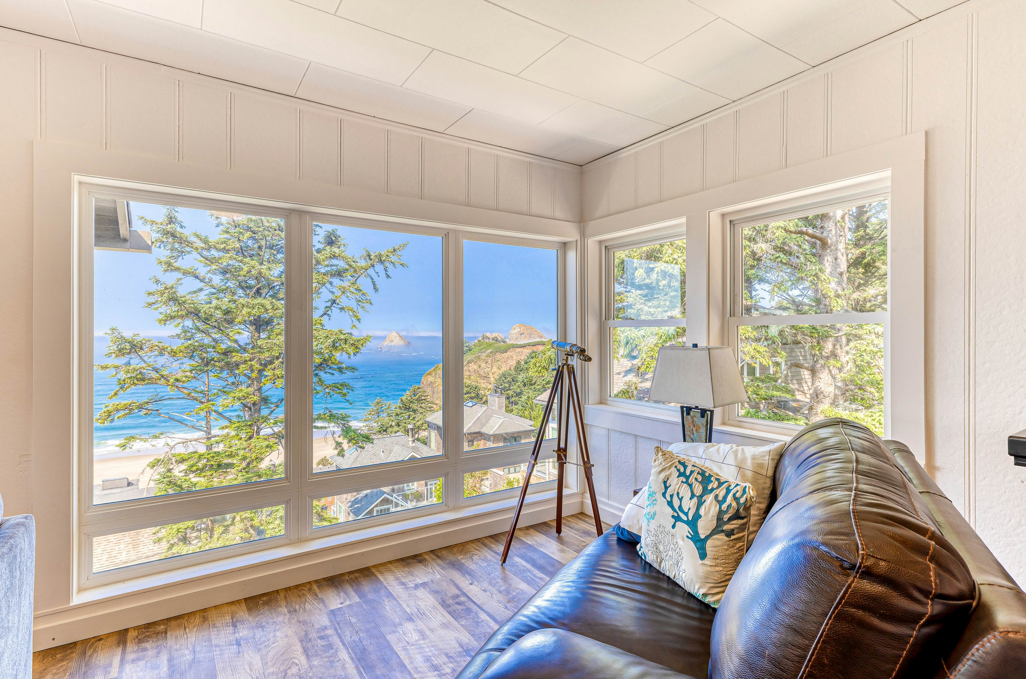 Spacious ocean view home with wood fireplace, grill, & deck - dog-friendly