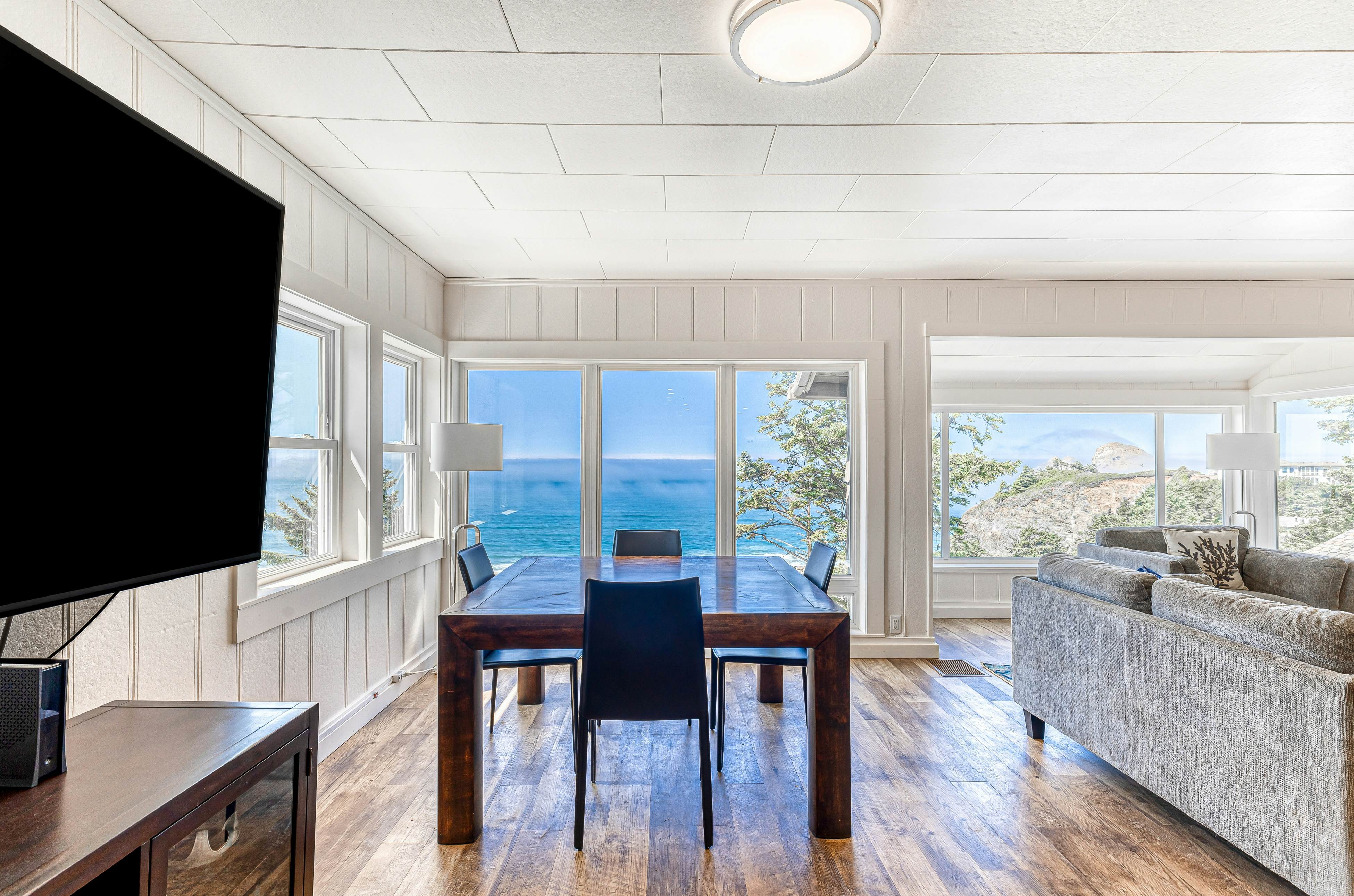 Spacious ocean view home with wood fireplace, grill, & deck - dog-friendly