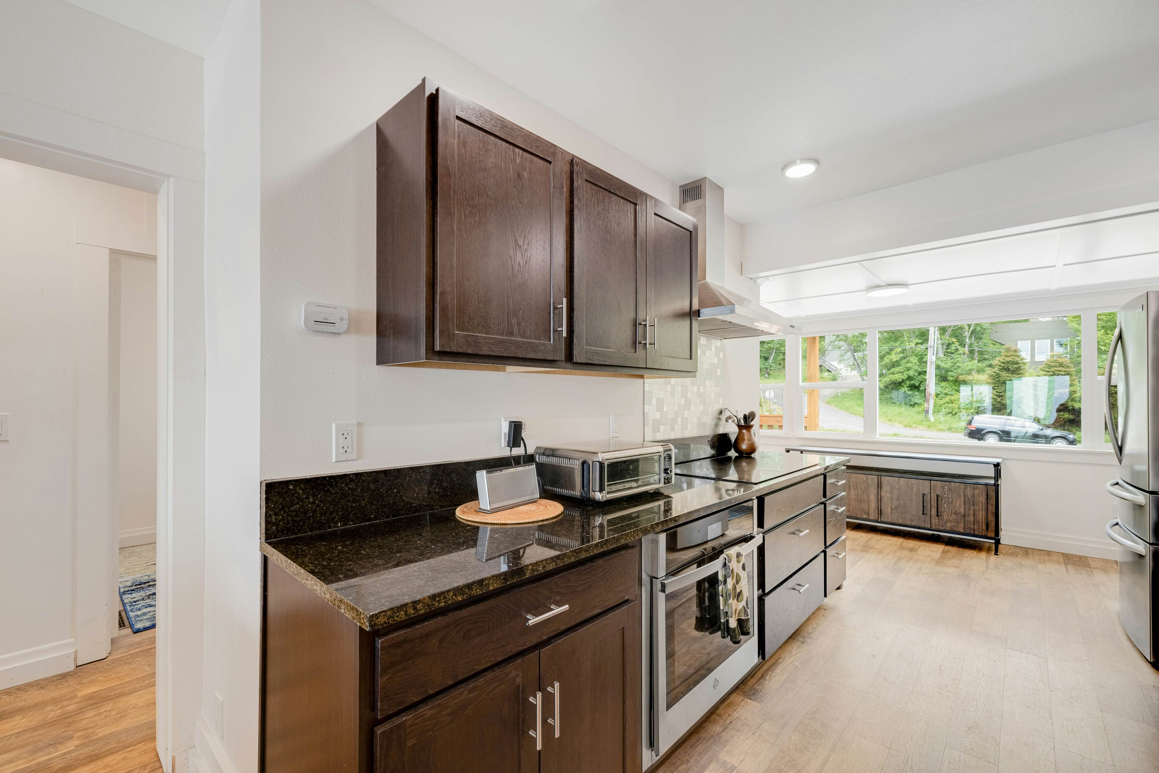 Spacious ocean view home with wood fireplace, grill, & deck - dog-friendly