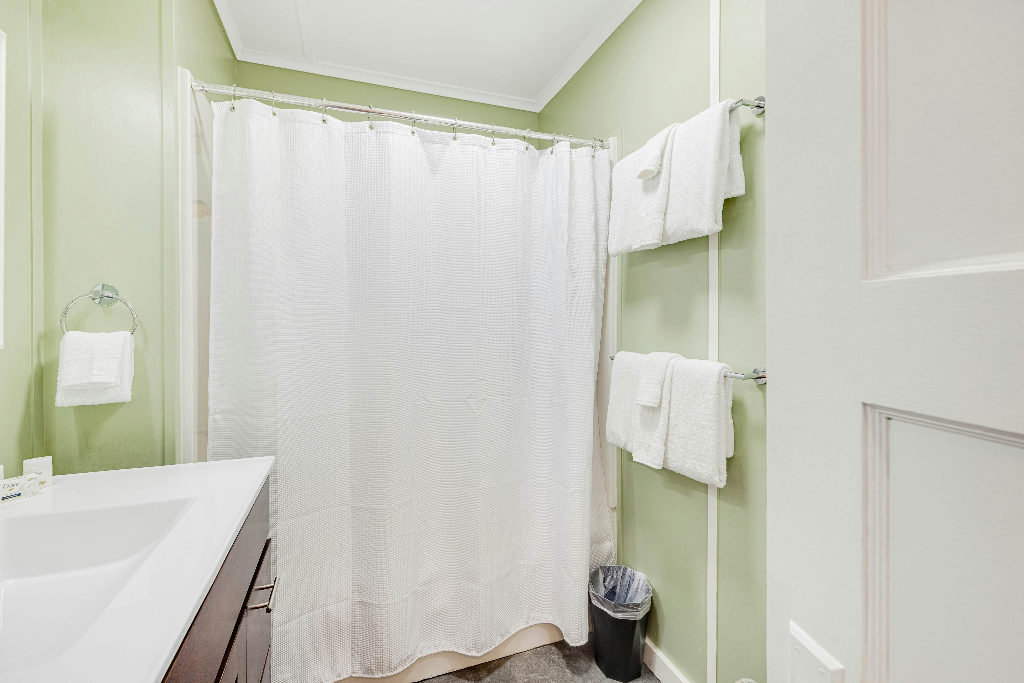 Spacious ocean view home with wood fireplace, grill, & deck - dog-friendly