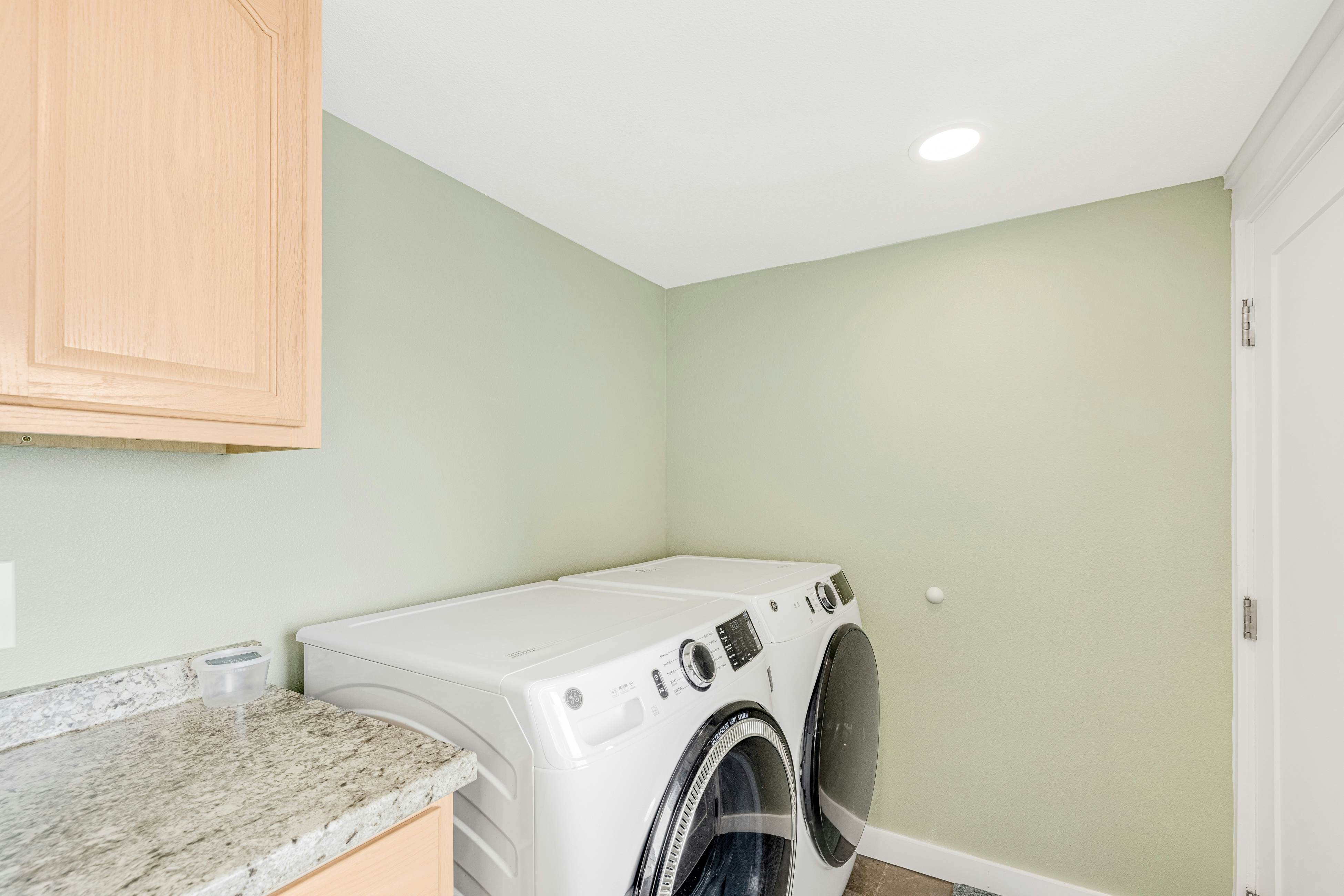 Spacious ocean view home with wood fireplace, grill, & deck - dog-friendly