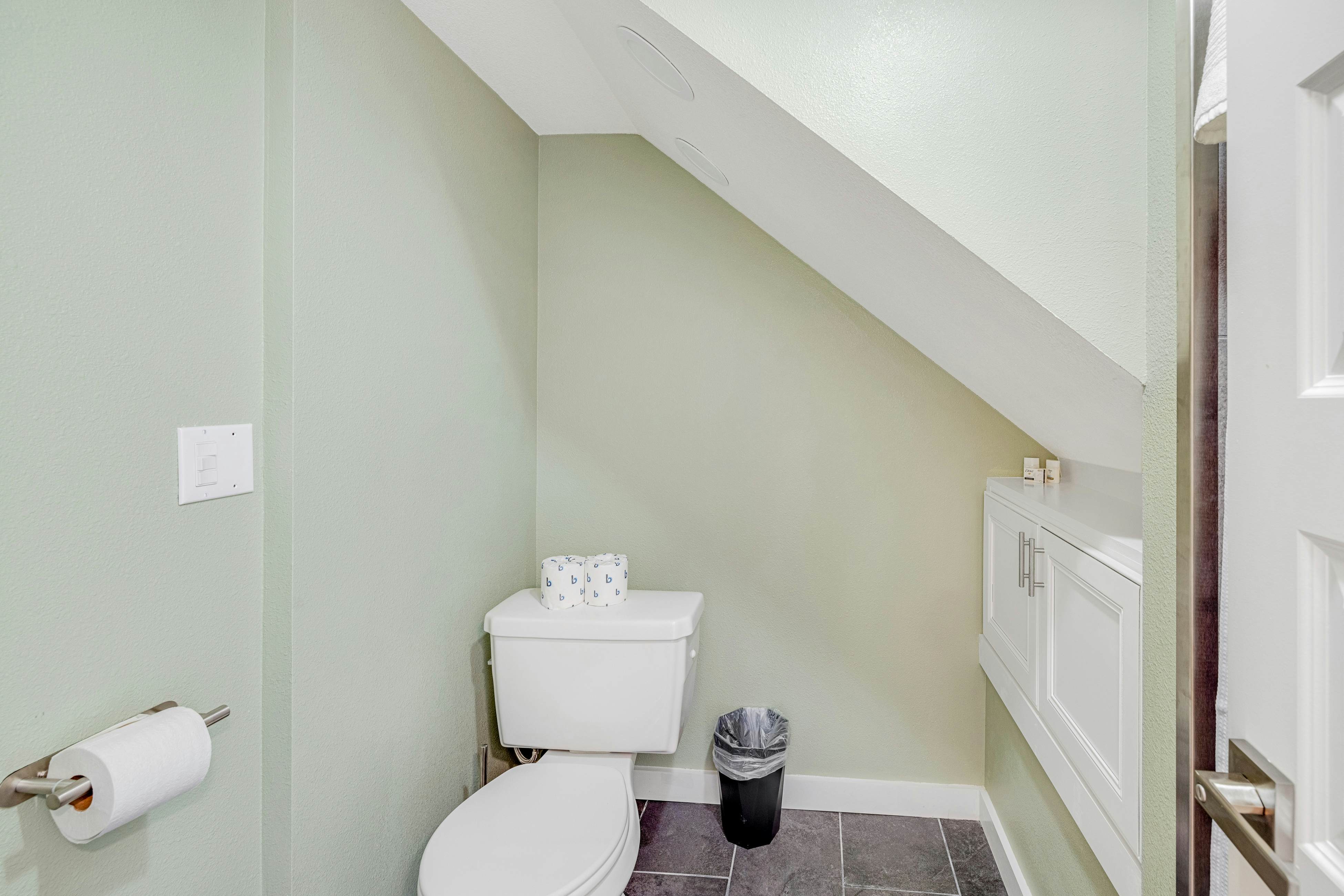 Spacious ocean view home with wood fireplace, grill, & deck - dog-friendly