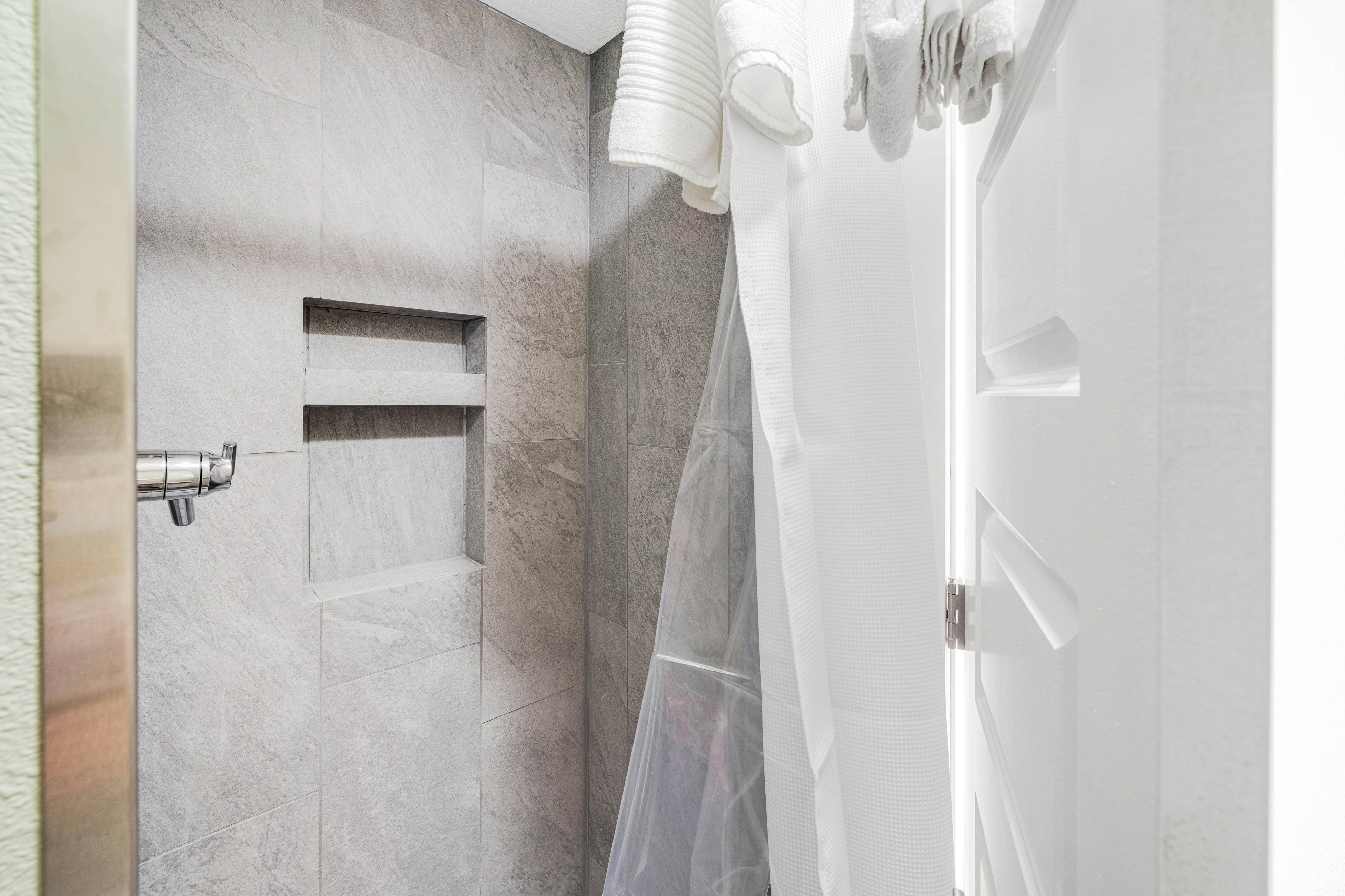 Spacious ocean view home with wood fireplace, grill, & deck - dog-friendly