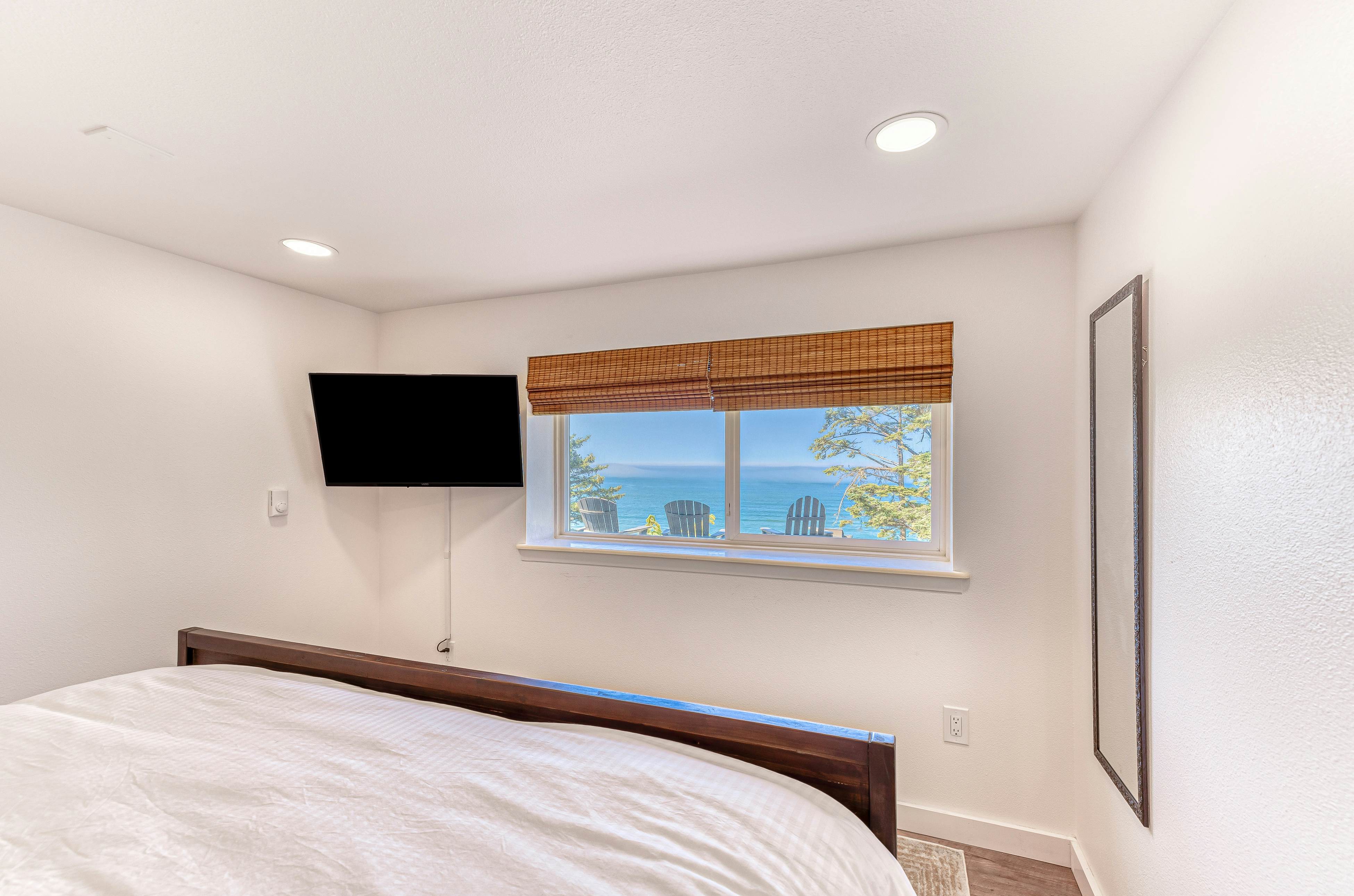 Spacious ocean view home with wood fireplace, grill, & deck - dog-friendly