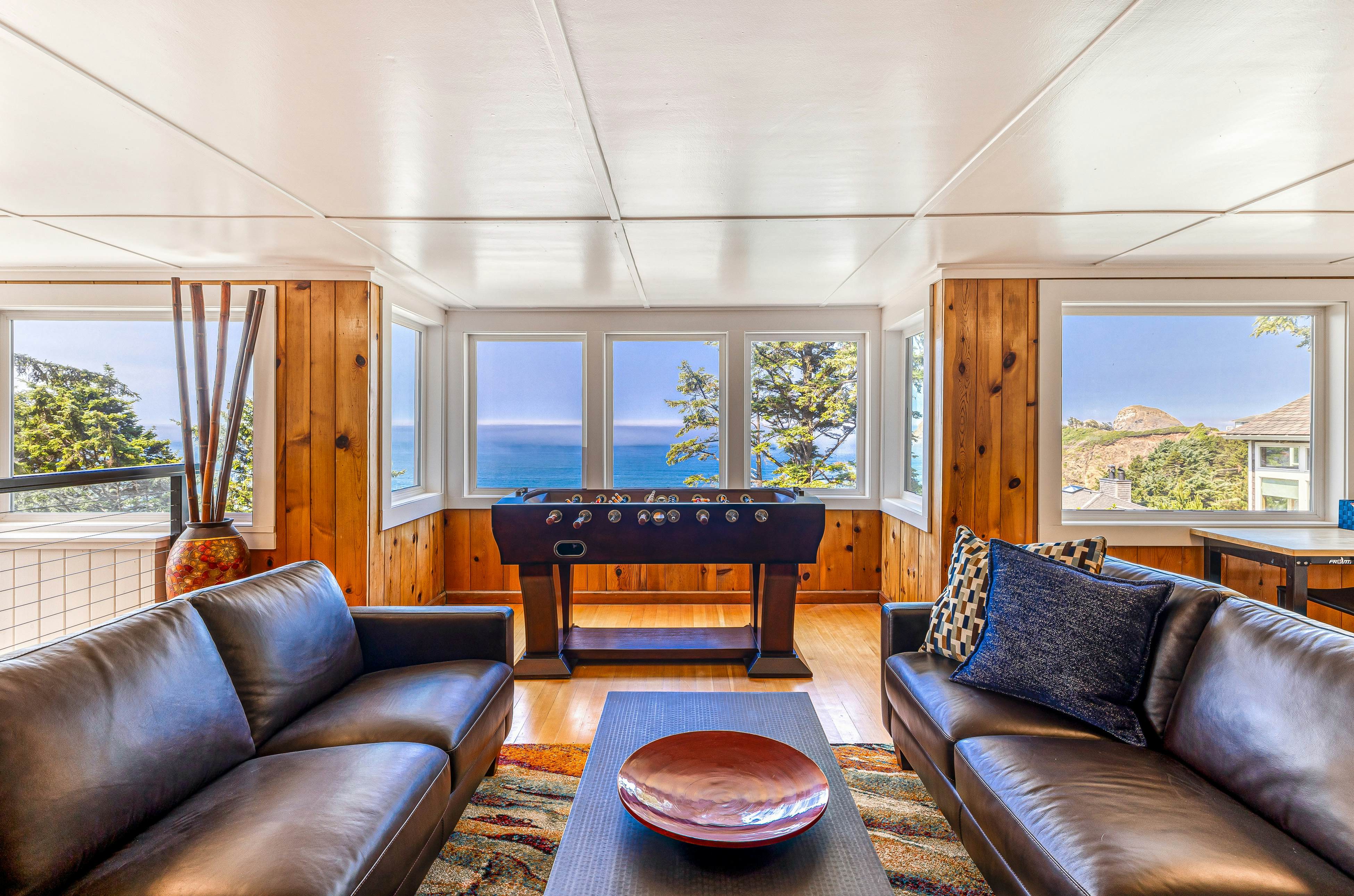 Spacious ocean view home with wood fireplace, grill, & deck - dog-friendly