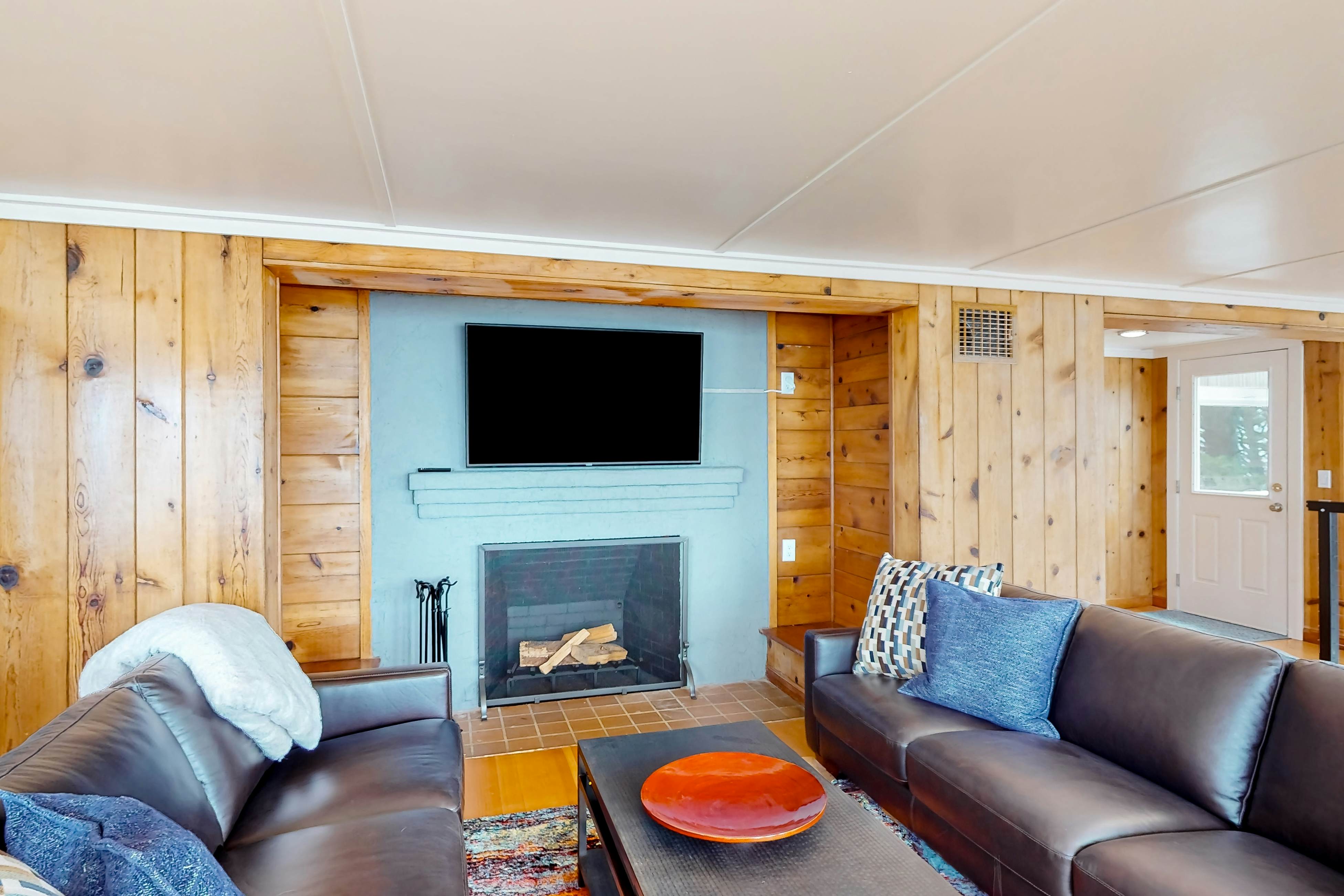 Spacious ocean view home with wood fireplace, grill, & deck - dog-friendly