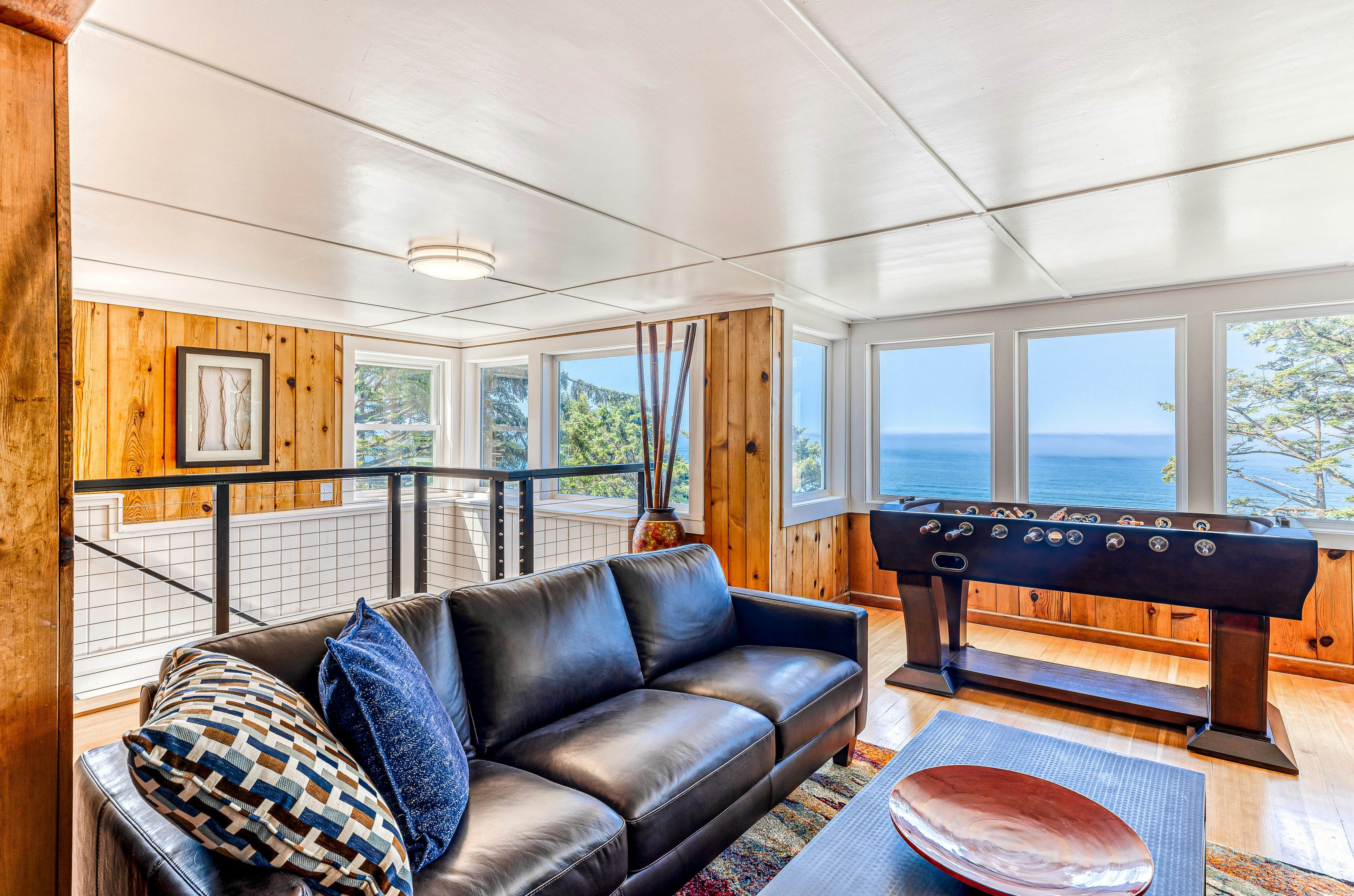 Spacious ocean view home with wood fireplace, grill, & deck - dog-friendly