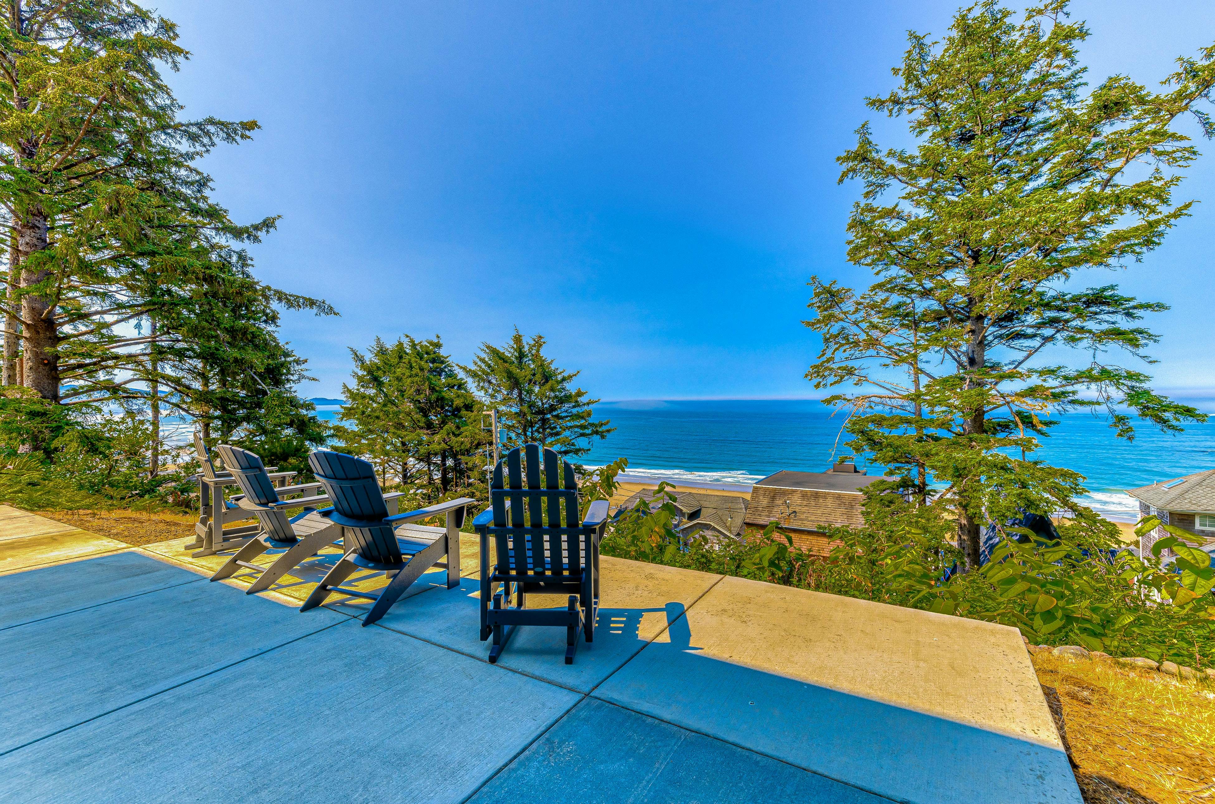 Spacious ocean view home with wood fireplace, grill, & deck - dog-friendly