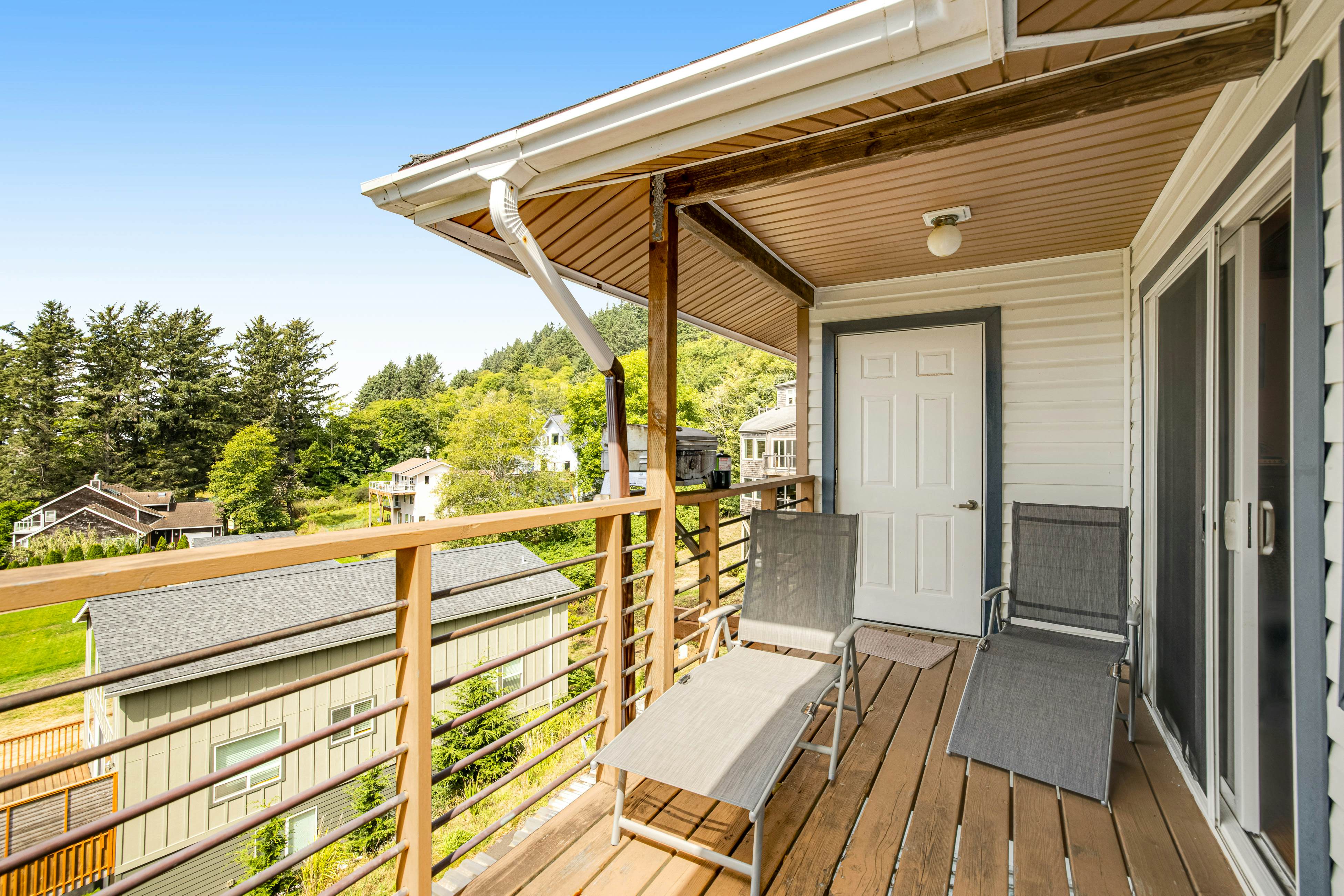 Welcoming Condo with Ocean Views and Private Hot Tub - Short Walk to the Beach