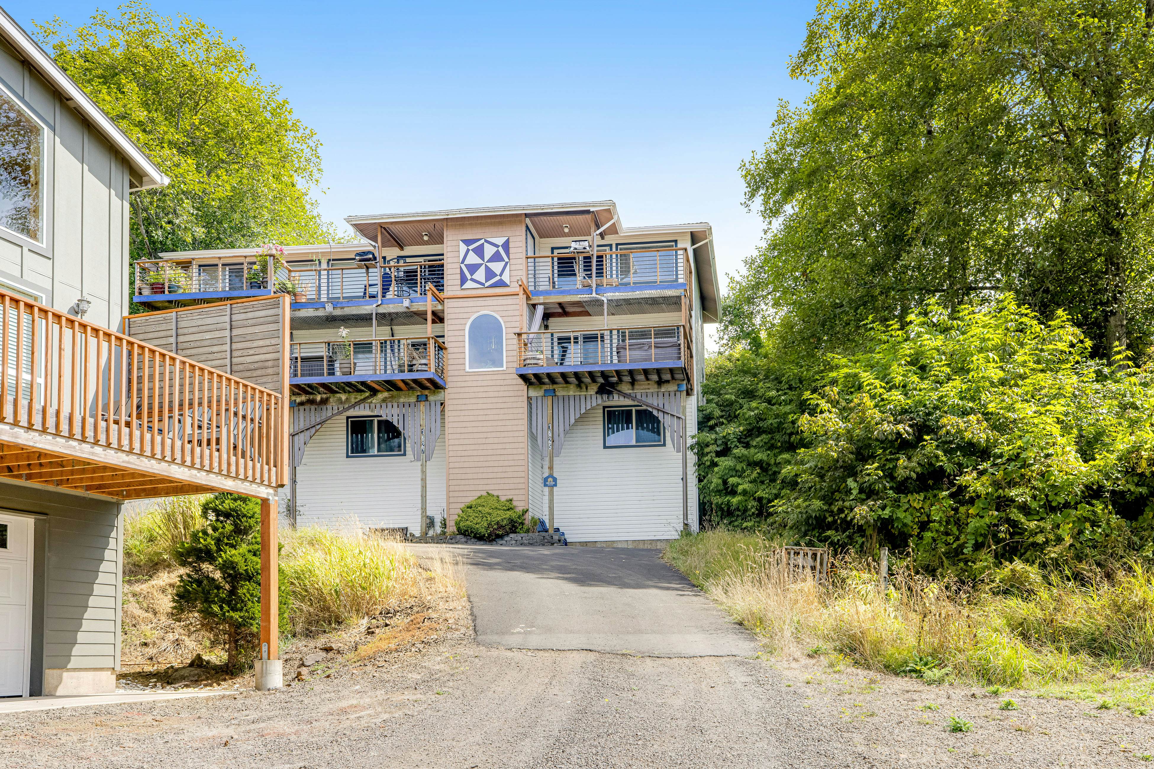 Welcoming Condo with Ocean Views and Private Hot Tub - Short Walk to the Beach