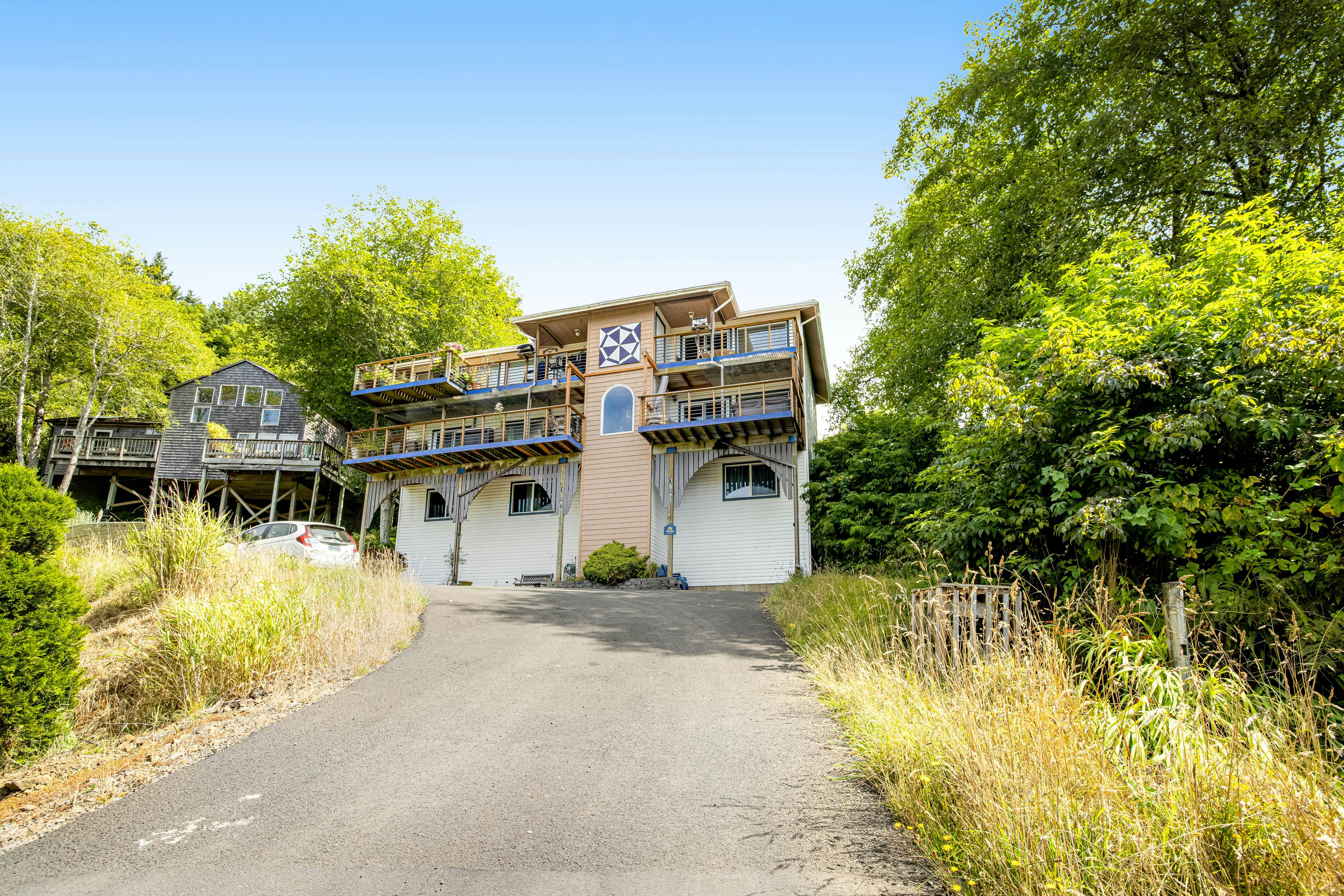 Welcoming Condo with Ocean Views and Private Hot Tub - Short Walk to the Beach