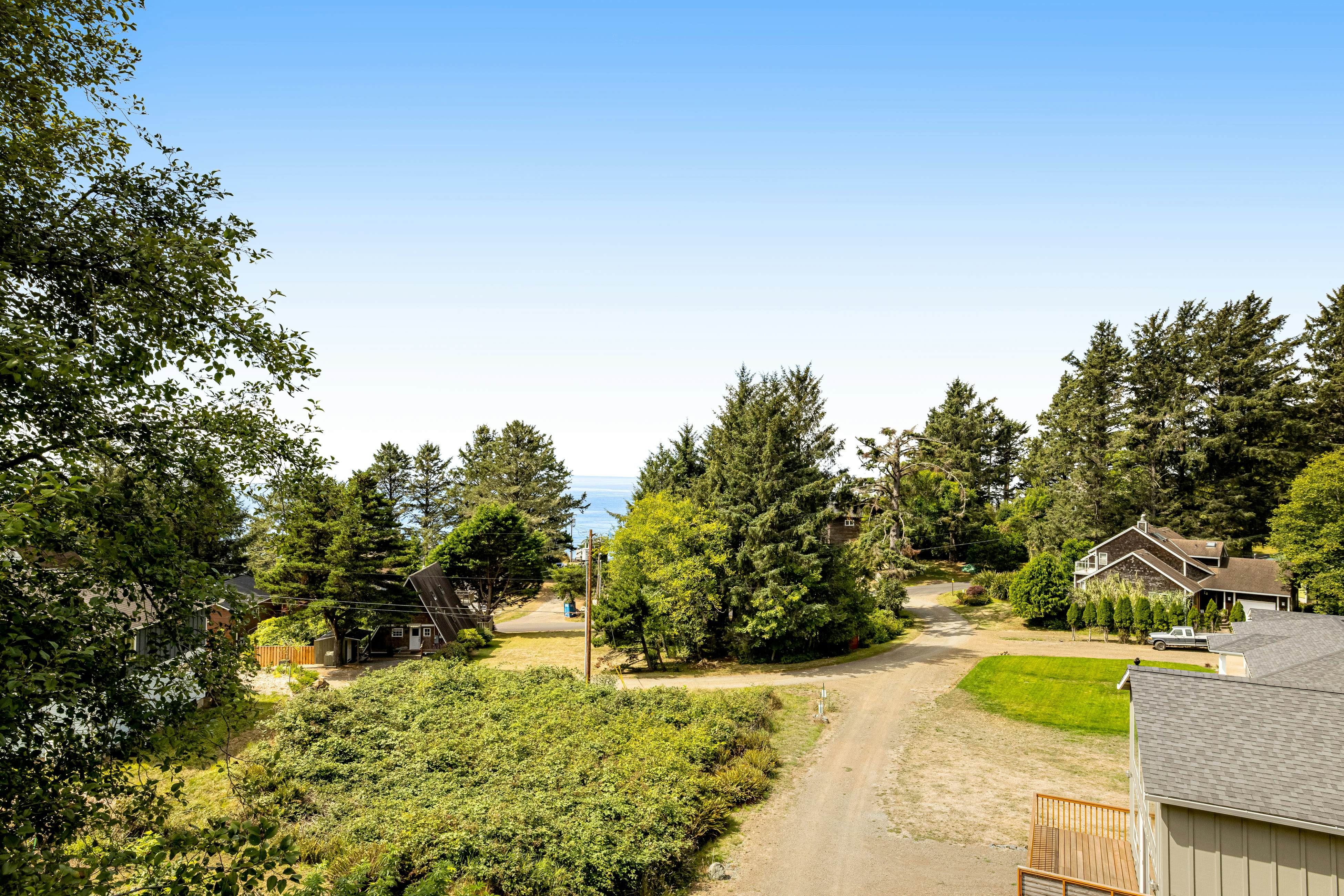 Welcoming Condo with Ocean Views and Private Hot Tub - Short Walk to the Beach