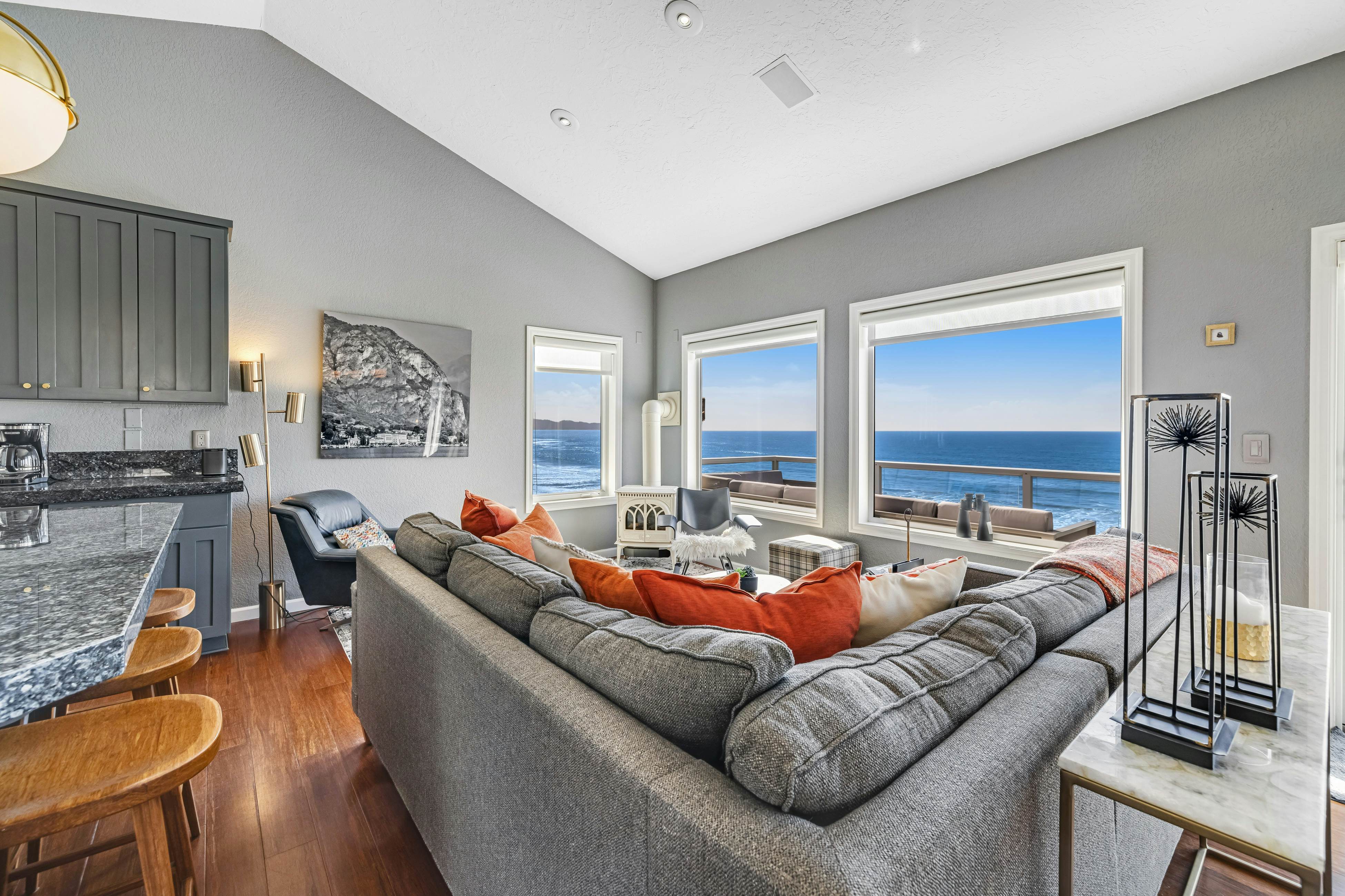 Remodeled home with multiple decks & ocean views - short walk to beach