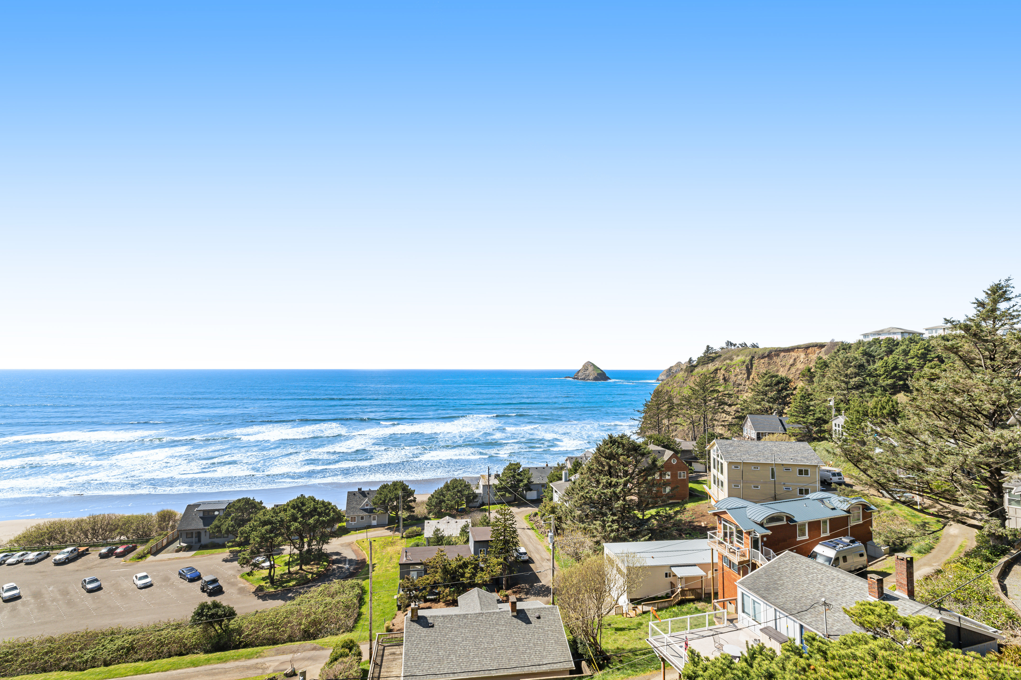 Remodeled home with multiple decks and ocean views short walk to beach