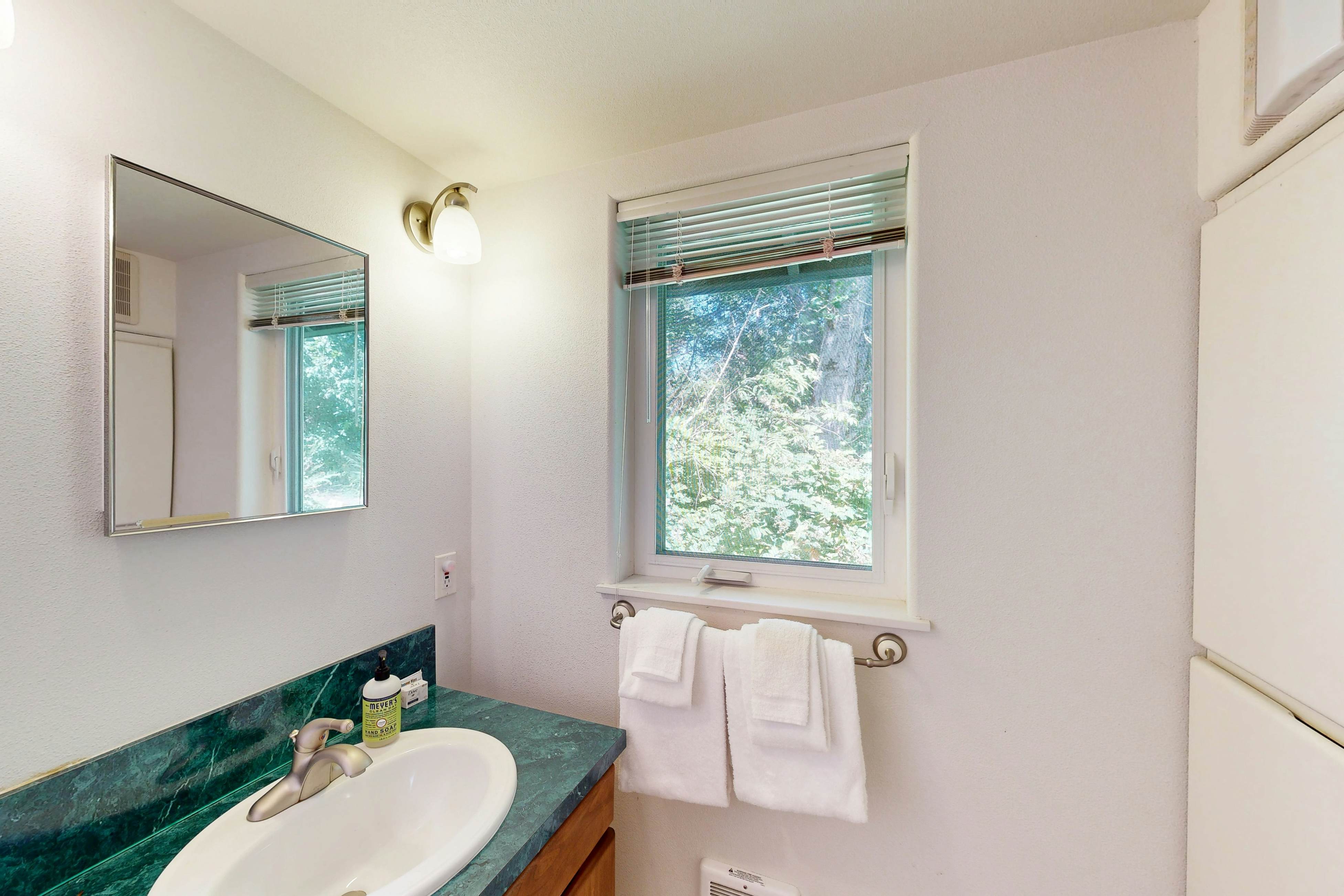 Custom dog-friendly home with Netarts Bay views - includes a separate casita