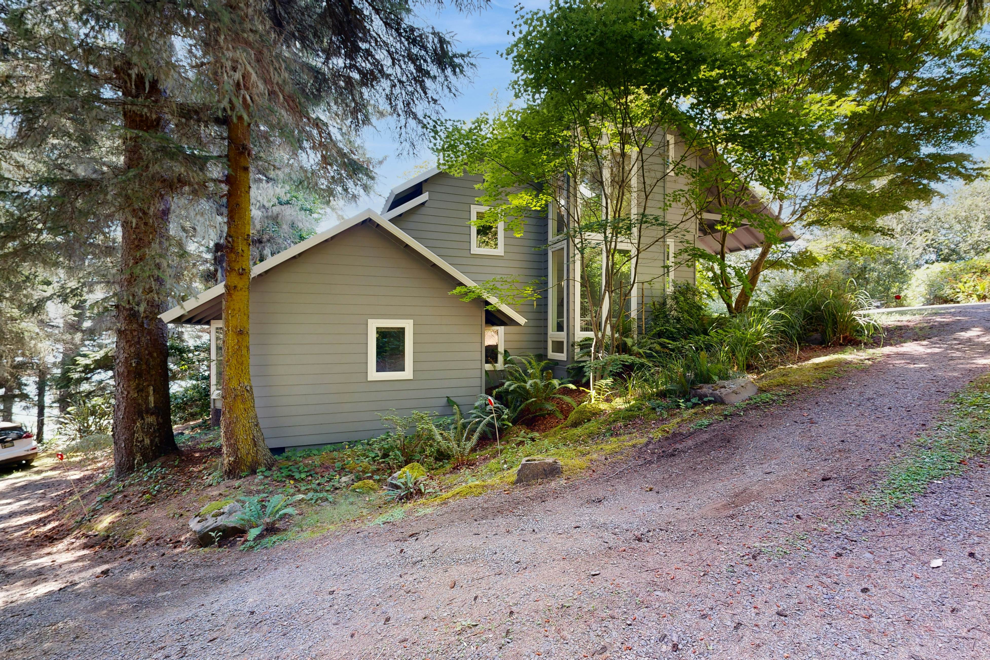 Custom dog-friendly home with Netarts Bay views - includes a separate casita