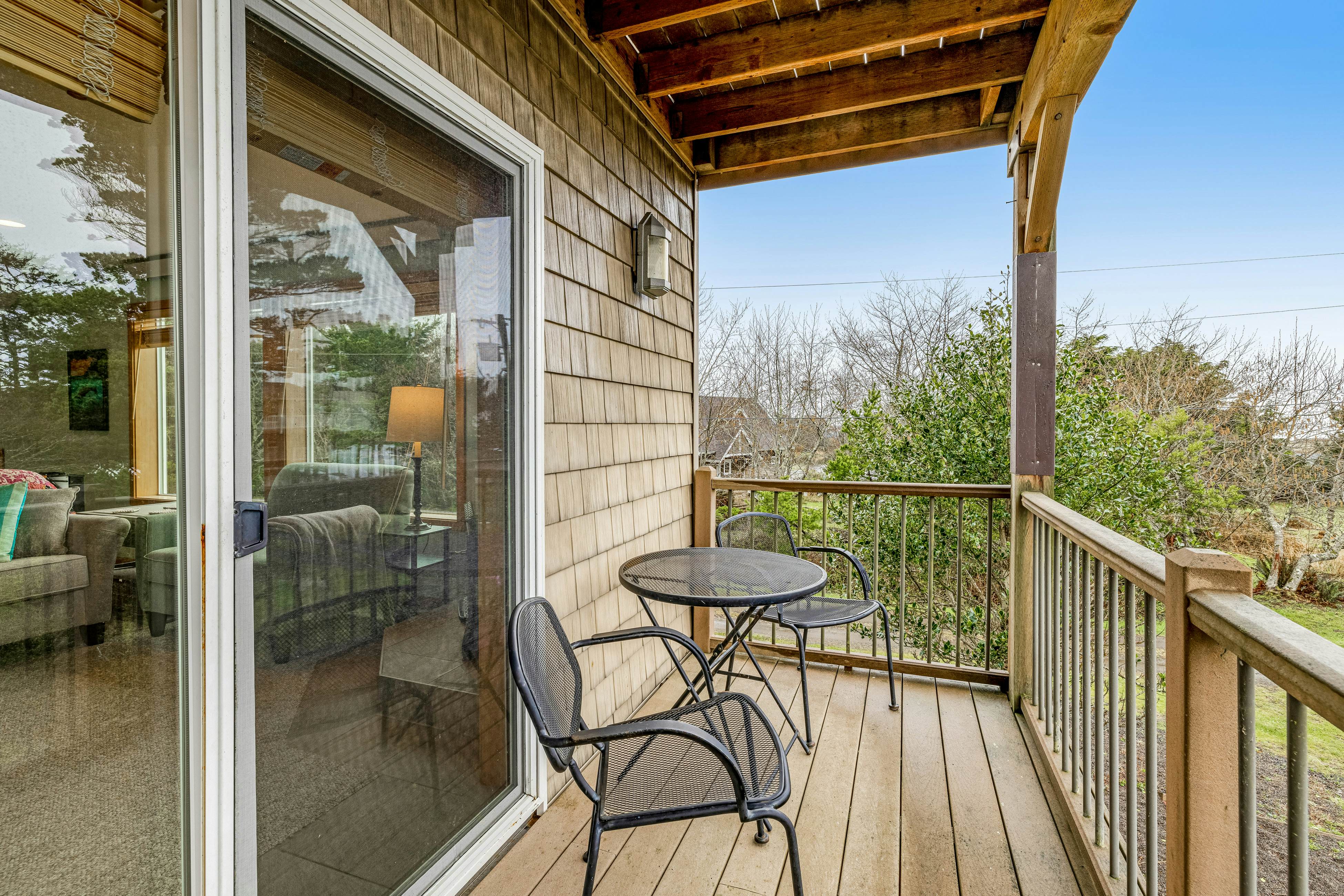 Lakefront escape with water views, grill, wrap-around deck - walk to beach