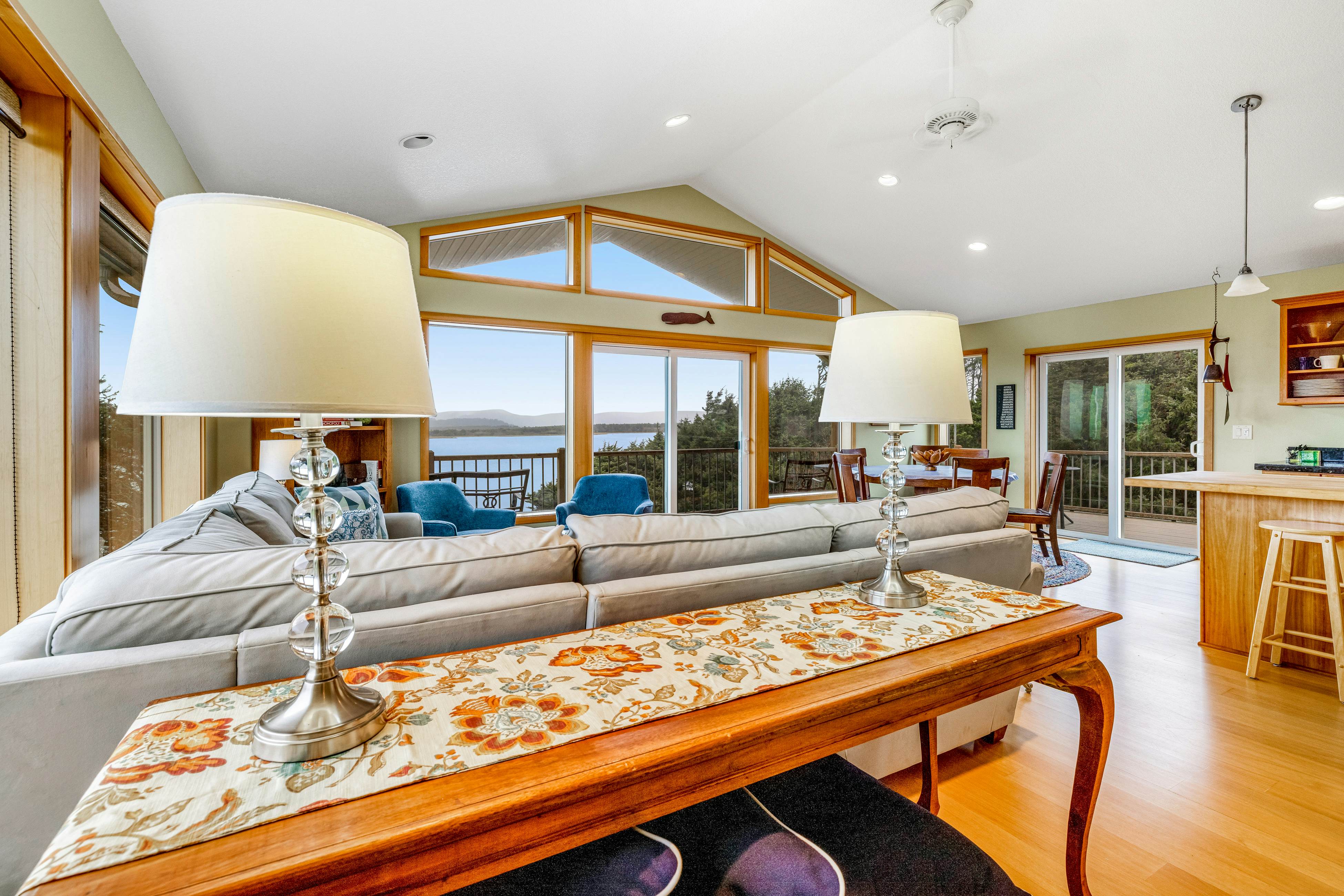 Lakefront escape with water views, grill, wrap-around deck - walk to beach