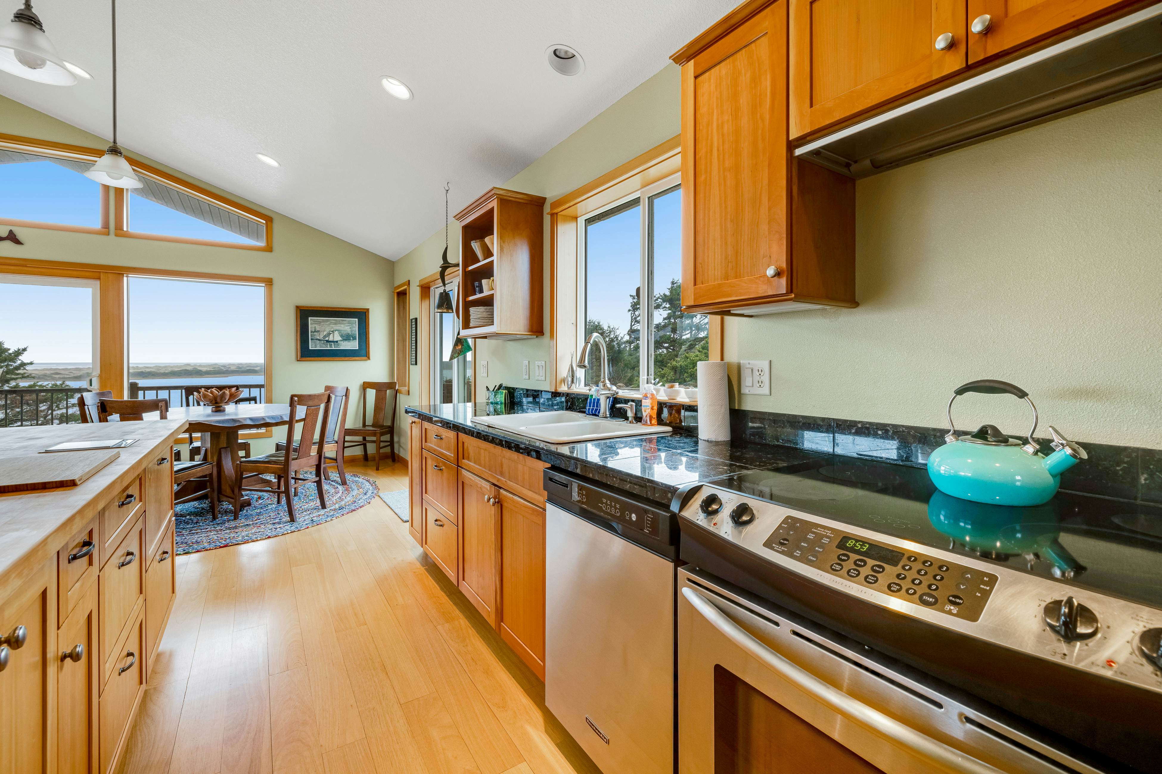 Lakefront escape with water views, grill, wrap-around deck - walk to beach