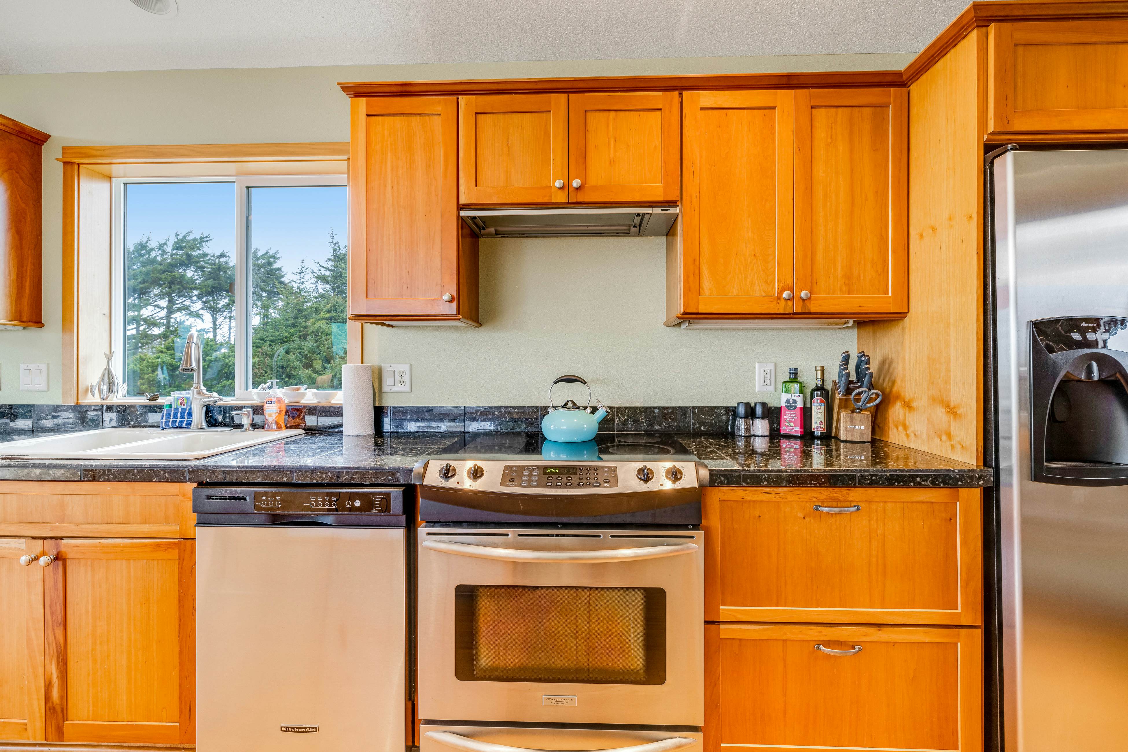 Lakefront escape with water views, grill, wrap-around deck - walk to beach